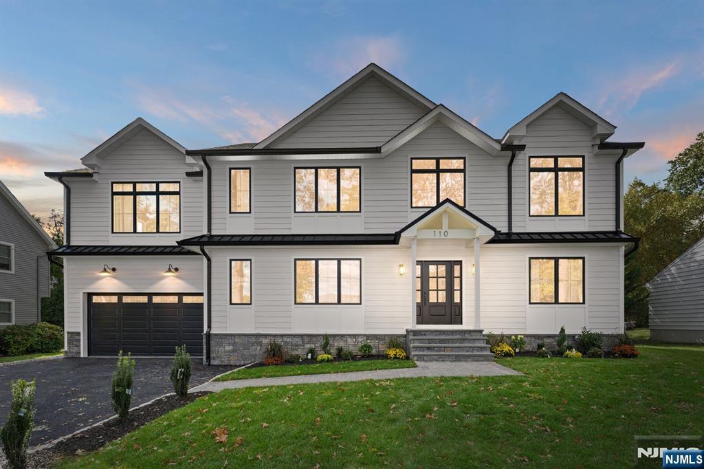 Experience Modern Luxury Redefined in this Stunning New Construction, ideally located in the highly sought-after town of Glen Rock. This impressive Colonial, rebuilt on an existing foundation, showcases charm & detail with white oak floors & exquisite designer details & lighting. The show stopping chefâ€™s kitchen features custom cabinetry, Thermador appliances, a prep pantry with additional cabinetry & refrigerator space, and a beautiful Taj Mahal waterfall island opening to the dining & family roomâ€”perfect for entertaining. A convenient first floor bedroom en-suite offers flexibility for guests or can be utilized as a home office. Upstairs, the spacious luxurious primary suite offers vaulted ceilings, two large walk-in closets, and a spa-inspired bath with soaking tub and oversized glass shower. Additional bedrooms include a private ensuite bedroom as well as 2 bedrooms with a shared Jack & Jill bathroom as well as a large laundry room. The finished lower level offers flexible space for a gym, rec room, or guest suite with a convenient full bathroom. With a paver patio, 2-car garage, large driveway, and proximity to top-rated schools, downtown, and NYC transit, this home blends refined living with effortless sophistication. Don't miss this Opportunity.