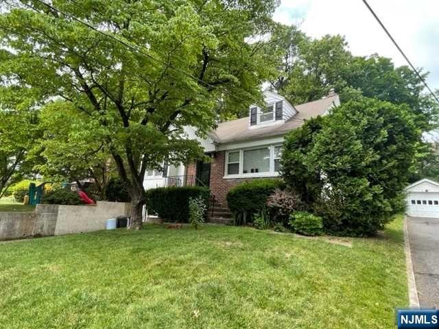 Modest exterior for spacious prime West Englewood home. Open floor plan. Granite counters in seven years young kitchen with breakfast bar. All large bedrooms with great closet space throughout. Close to Houses of Worship, transportation, shopping, parks and schools. Rear retaining wall being replaced/repaired.