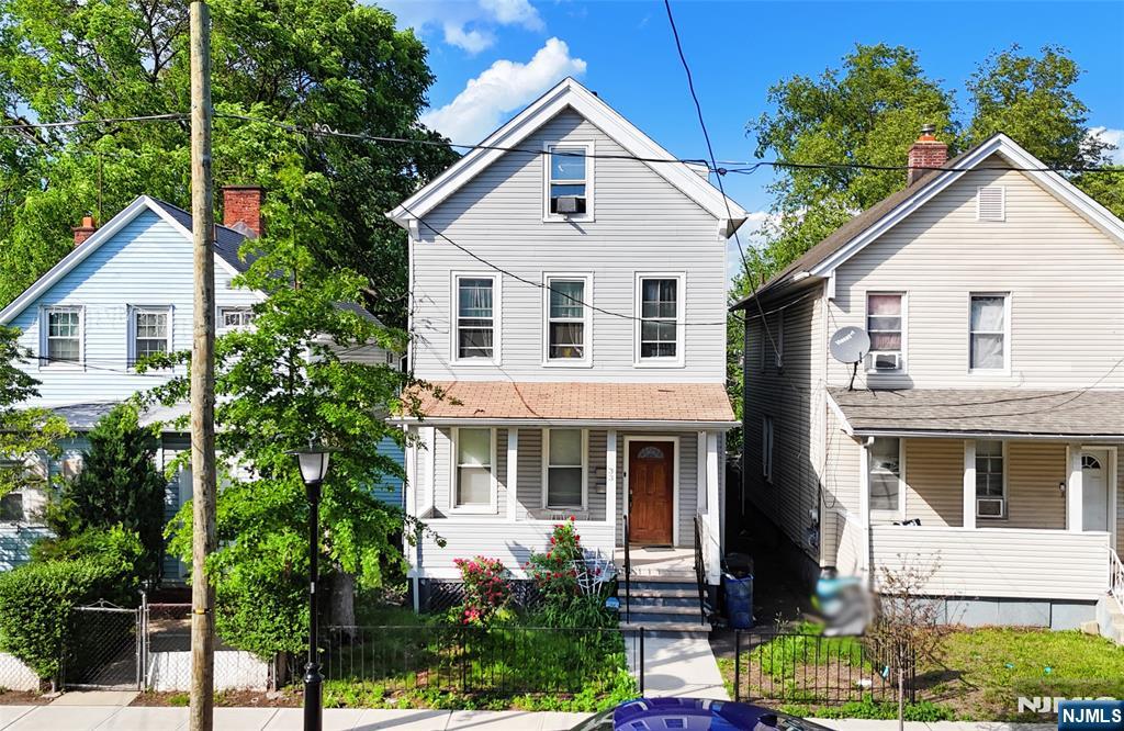 Nestled in a convenient neighborhood, this well-maintained two-family home offers a great opportunity for both homeowners and investors. Each unit features three bedrooms, a comfortable living room, and an eat-in kitchen, providing functional living space for everyday needs. An additional room in the attic adds flexible space that can be used for storage, a home office, or other possibilities. The partially finished basement offers even more room to expand or customize. A private backyard provides a quiet outdoor retreat, ideal for relaxing or entertaining.
