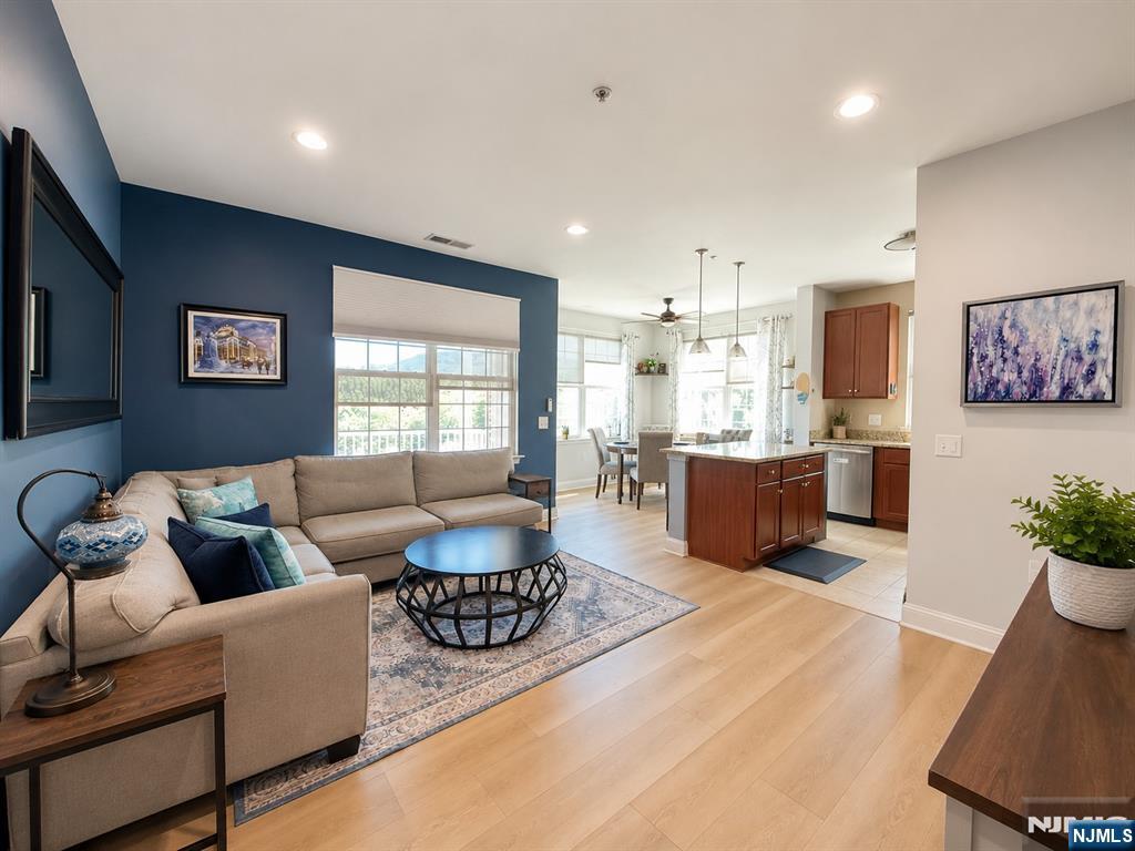 LIVE THE GRANDE LIFE! So many upgrades in this beautiful 2 bedroom, 2 bath condo on the 3rd flr with elegant living space. In the past year, new heating & cooling system, new hot water heater, replaced carpet with Luxury Vinyl Tile throughout. Over $25,000 in upgrades! Open floor plan with lots of natural sunlight! Corner unit facing the front of the building. Great location in building 5 which is directly across from the clubhouse & all amenities. Featuring 2 bedrooms w/walk-in-closet each bedroom. The primary bedroom has a full bath. There is a computer room/office. Bigger kitchen w/center island, beautiful kitchen cabinets, granite countertops. Balcony off kitchen dining area. Laundry room accommodates full size washer & dryer side by side! Amazing low Riverdale taxes only $6,805. 1 Car assigned parking space in garage with elevator access and additional parking outside of building. Experience the Grande life with a wealth of amenities, including 2 clubhouses equipped with fitness centers, billiards rooms, conference rooms, party rooms, tennis and basketball courts, 2 swimming pools, and much more! Enjoy a fantastic location with easy access to major highways, shopping and restaurants. PET POLICY- MAX 2 PETS-35LB WEIGHT LIMIT PER PET.