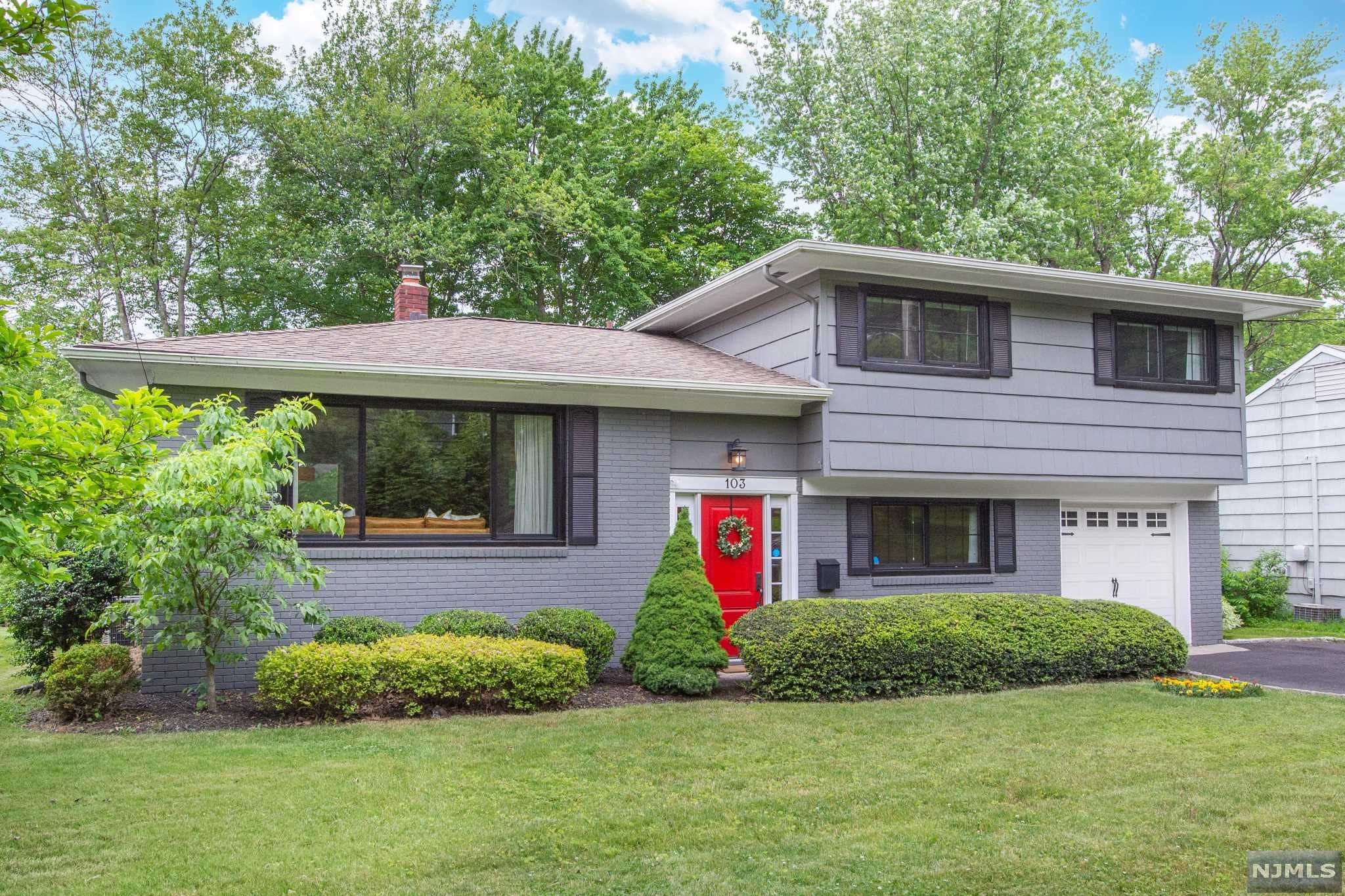 Dreamy,MOVE-IN-READY 3bedroom,2.5bathroom split level in the heart of Summit! Well-designed floor plan:open,modern and very few steps throughout the house indoor&outdoor.House was impeccably renovated in 2017,HW floors,Central AC,Sec System all brand new windows installed just a few months ago!The 1st flr has an incredible flow,offering both an elegant&formal living rm and proper dining rm, as well as a spacious, sun filled family rm for a more relaxed living w/ powder rm.Chef's EIK w/ breakfast peninsula.On the 2nd level there are 3 LARGE bedrooms and main bathrm w/ double vanity.Very few steps lead to the lower level which is currently used as a guests'suite,but suitable for a home office/rec room,too.On this level there is also a full bathroom,laundry rm+storage rm.Huge back deck,perfect for entertaining overlooks the backyard & greenery.Mature trees and manicured landscaping in the front yard give privacy.1car attached garage!Direct train to NYC,walk to elemen & shops in town