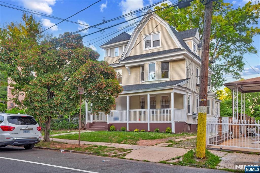 Experience this incredible fully detached three-family home. This rare property offers a total of three separate units. Unit 1 and 2 are meticulously arranged with an identical, highly rentable layout of 3 spacious bedrooms and 1 full bathroom. While Unit 3 has 2 bedrooms 1 bath. Perfectly suited for a savvy investor looking for immediate cash flow or an owner-occupant looking to have their mortgage paid by tenants, this building delivers massive value and long-term appreciation potential. Move-in ready kitchens equipped with modern stainless steel gas appliances, crisp white Shaker cabinetry, and stylish glass mosaic tile backsplashes, premium countertop with light stone counters and a dedicated granite breakfast bar island perfect for quick meals or entertaining. Full bathrooms featuring clean white shaker-style storage vanities and custom wrap-around earth-toned stone tile work with dedicated walk-in shower enclosures. Situated in a highly commutable residential neighborhood with easy access to local transit options, parks, and retail corridors. Don't miss out on this opportunity!