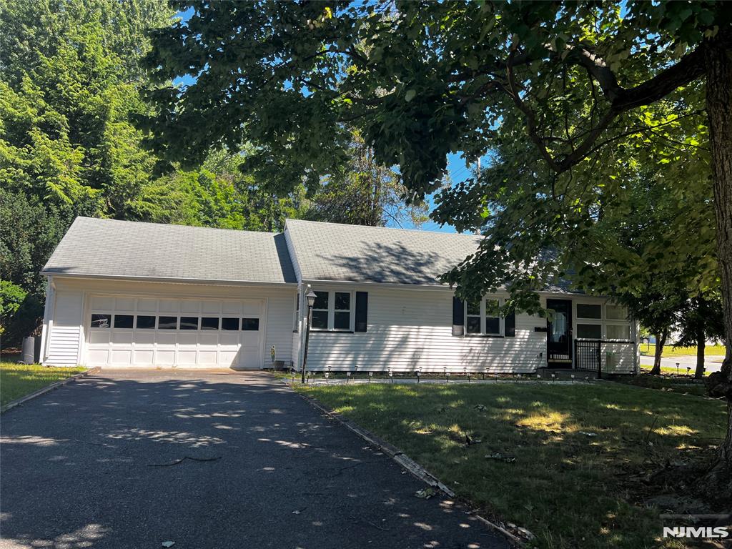 Exceptional opportunity to renovate, expand, or build new in one of Glen Rock's most desirable neighborhoods. Set on an oversized 10,000+ sq. ft. lot, this property offers endless potential for homeowners, builders, and investors alike. The existing ranch features 3 bedrooms, 1 full bath, hardwood floors throughout, central air conditioning, forced-air heat, and an attached 2-car garage. A spacious patio and expansive yard provide plenty of room for outdoor living and future enhancements. Conveniently located near top-rated schools, parks, shopping, and transportation.