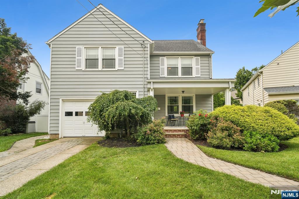 Welcome home to this beautifully renovated and meticulously maintained Colonial, ideally located directly across from the entrance to the sought-after 121-acre Brookdale Park. Enjoy walking trails, tennis and pickleball courts, playgrounds, a dog park, summer concerts, art shows, and even front-row views of the Fourth of July fireworks from your own porch.This move-in-ready home blends timeless charm with modern updates. An inviting vestibule opens to a sun-filled living room with a wood-burning fireplace, refinished hardwood floors, arched doorways, and beautiful moldings. The formal dining room flows into the updated eat-in chef's kitchen featuring custom cabinetry, quartz countertops, and stainless steel appliances.Upstairs are three spacious bedrooms with cedar closets and an updated full bath. The finished third floor offers a generous fourth bedroom with new carpeting and additional storage. The finished basement adds flexible living space with a recreation room, exercise area, and laundry room. Additional highlights include central air, a new roof, and brand-new windows. Outside, enjoy a private stone patio surrounded by beautifully landscaped gardens. Just moments from Brookdale Elementary, neighborhood shops, restaurants, coffee houses, and NYC transportation, this exceptional home offers the perfect blend of character, comfort, and an unbeatable location.