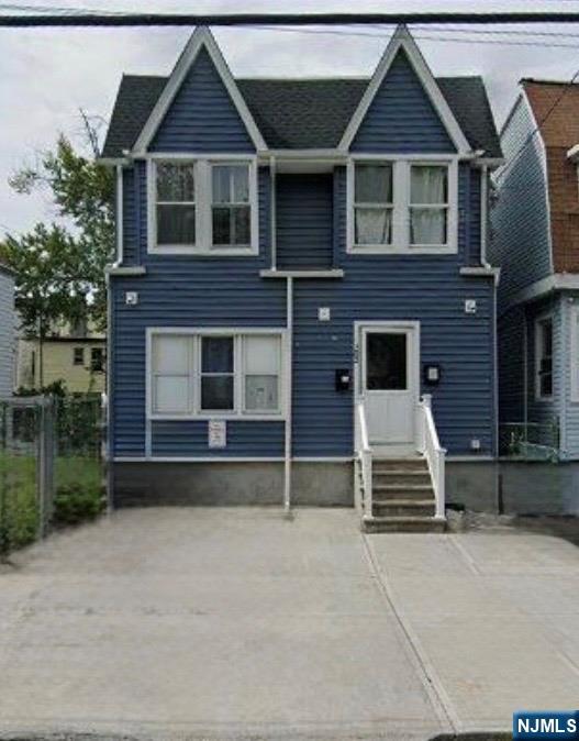 Rare find! This expansive 6-bedroom, single-family residence offers the perfect blend of space, comfort, and affordability. The main level welcomes you with a charming enclosed porch, leading into an open-concept living and dining area designed for large gatherings. The finished basement offers significant added value with 2 additional bonus rooms and a full bathroom, perfect for a home office, gym, or guest quarters. Enjoy the modern convenience of full central air and heat throughout. Step outside to a private backyard perfect for summer grilling. Located in a commuterâ€™s paradise, you are just minutes from I-280, the Garden State Parkway, and public transit for a swift trip into NYC. Experience the luxury of space in the heart of Newark! (Note: Vacant lot behind the property is not included in the sale).