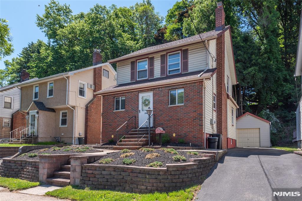 Welcome home to this beautifully maintained Colonial offering comfort, space, and pride of ownership throughout. This clean and well-cared-for home features four bedrooms, including a finished walk-up attic that provides a versatile space ideal for a fourth bedroom, home office, playroom, or guest suite.The inviting floor plan offers spacious living areas perfect for everyday living and entertaining. Outside, enjoy a fenced rear yard backing to extended wooded area (very deep 190 foot lot) that provides privacy and room to play, garden, or relax. A rear deck creates the perfect setting for outdoor dining, summer barbecues, and gatherings. Move-in ready and thoughtfully maintained, this charming home combines classic Colonial character with flexible living space both inside and out. Prime Brookdale Section near Brookdale Park, Lion Gate Park, Glen Ridge Country Club & Famous Holsten's Ice Cream, Candy Restaurant!
