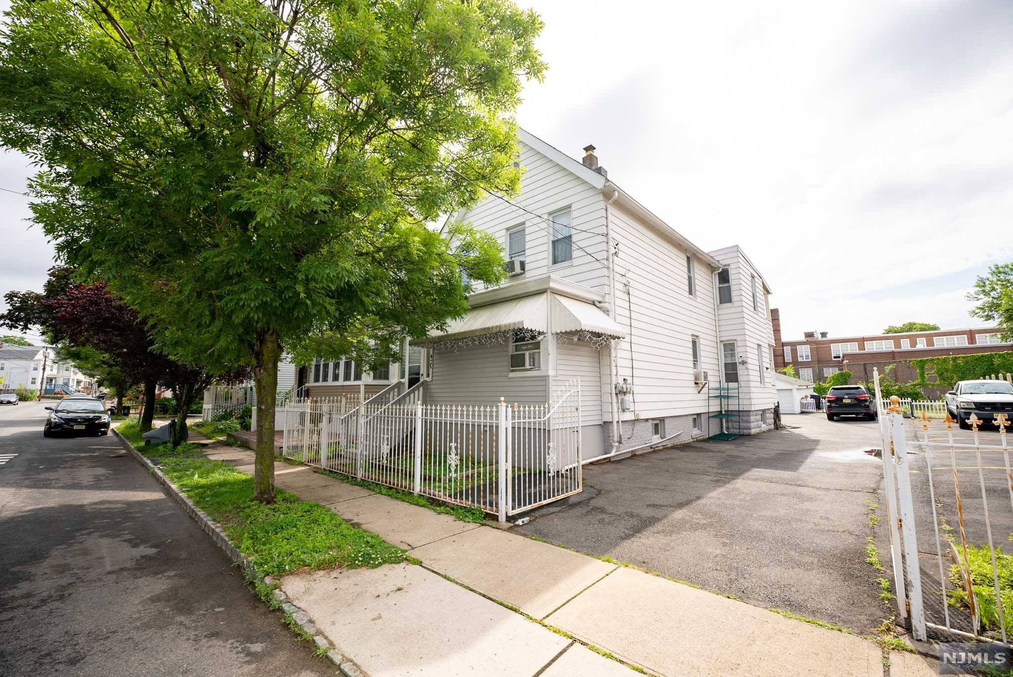 Beautiful recently renovated 2 family property located off of Bloomfield ave ! Near public transportation to NYC and schools! This home sits on a double lot! With parking that can fit up to 10 cars! Double garage used for storage! This house is perfect for an investor or owner occupant looking to offset their living expenses! Why rent when you can own! Won't last!