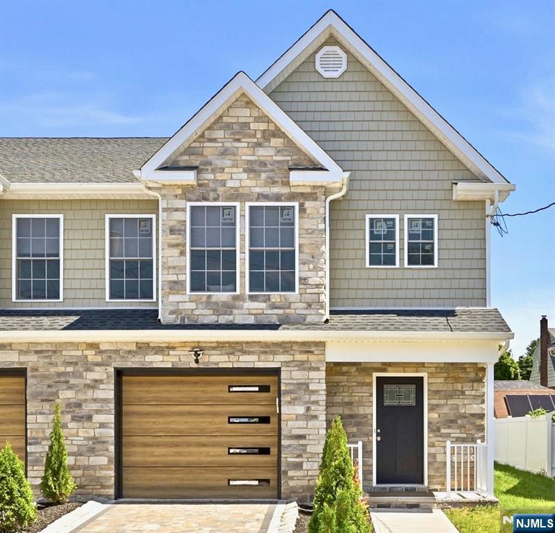 MODERN LUXURY IN THE HEART OF LODI! STEP INTO THIS STUNNING NEW CONSTRUCTION SIDE-BY-SIDE SINGLE-FAMILY HOME WHERE STYLE, COMFORT, AND SMART DESIGN COME TOGETHER. LOCATED IN A HIGHLY DESIRABLE LODI NEIGHBORHOOD WITH EASY NYC COMMUTING, THIS HOME OFFERS THE PERFECT BLEND OF CONVENIENCE AND UPSCALE LIVING. THE STRIKING EXTERIOR FEATURES A STONE PAVER DRIVEWAY, MODERN GARAGE DOORS, AND A BEAUTIFUL COMBINATION OF STONE AND VINYL SIDING. INSIDE, THE OPEN-CONCEPT LAYOUT BOASTS A SUNLIT LIVING ROOM, DINING AREA, BREAKFAST NOOK, AND A CHEF'S KITCHEN WITH QUARTZ COUNTERTOPS, STAINLESS STEEL APPLIANCES, CUSTOM CABINETRY, AND DESIGNER TILE. GLASS DOORS LEAD TO A PRIVATE, FENCED BACKYARD PERFECT FOR ENTERTAINING OR RELAXING. THE MAIN LEVEL ALSO OFFERS A CONVENIENT POWDER ROOM. UPSTAIRS, THE PRIMARY SUITE FEATURES CATHEDRAL CEILINGS, A WALK-IN CLOSET, AND A SPA-INSPIRED ENSUITE. THREE ADDITIONAL BEDROOMS, A FULL BATH, AND A SECOND-FLOOR LAUNDRY ROOM COMPLETE THE LEVEL. THE EXPANSIVE THIRD-FLOOR BONUS ROOM IS IDEAL FOR A HOME OFFICE, GYM, MEDIA ROOM, OR GUEST SUITE. ADDITIONAL FEATURES INCLUDE WIDE-PLANK FLOORING, 2-ZONE HVAC, DESIGNER FINISHES, AND ACCENT LIGHTING. BEST OF ALL, THIS HOME IS BACKED BY A 10-YEAR NEW HOME BUILDER WARRANTY, PROVIDING EXCEPTIONAL PEACE OF MIND AND LONG-TERM VALUE.
