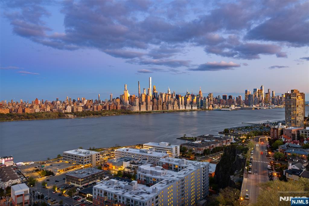 Million dollar views + $8000 in Buyer Savings! Seller will pay the existing special assessment in full at closing & is offering an additional concession covering the buyerâ€™s escrow pre-pay requirement (3 months HOA) and capital contribution fee (2 months HOA). These outstanding benefits significantly reduce upfront closing costs and enhance overall affordability! Inside, this light-filled one bed / one bath unit you'll find a move-in-ready layout designed for everyday living. Features include WTW carpeting, recessed lighting, abundant closet space, & a generously sized bedroom w a walk-in closet and stunning city views. The full bath includes a tub/shower combo, while the bright living area opens to a large private balconyâ€”showcasing the backdrop of the NYC skyline & Hudson River. Conveniently located near parks, shopping, & transportation, NJT bus service is available directly outside the building for an easy commute. Building amenities include a fitness center, available parking, and on-site laundry located on the same floor for added convenience. Additional building enhancements are already underway, including a renovated pool anticipated to reopen in late Summer 2026 and a modernized lobby expected to be completed by July 2026. A rare opportunity to enjoy spectacular views, outstanding convenience, and exceptional overall value in a highly desirable location.
