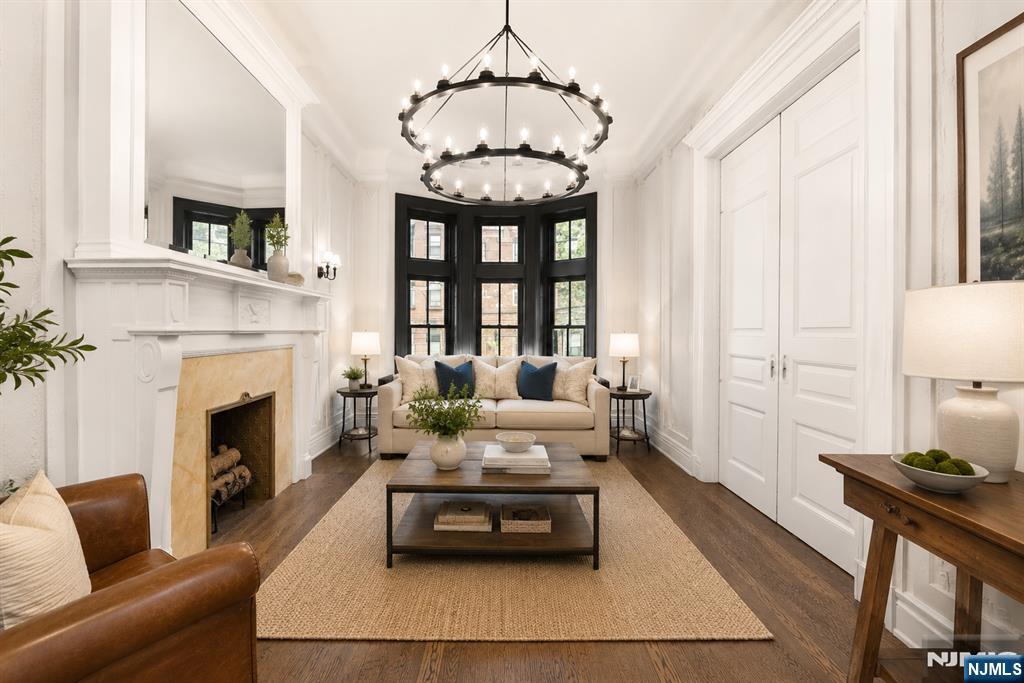 An extraordinary opportunity to own one of Hoboken's most historically significant residences, seamlessly blending timeless brownstone elegance with modern luxury. This distinguished home is part of the city's rich heritage, having been purchased by Frank Sinatra for his parents in the 1940s, adding a remarkable provenance that few properties can claim. Offered for sale is a fully gut-renovated owner's duplex paired with a renovated one-bedroom garden apartment, creating a unique opportunity for multigenerational living, guests, a private home office, au pair quarters, or supplemental rental income. Every inch of this exceptional duplex condo has been thoughtfully redesigned while preserving the timeless character and architectural integrity that define Hoboken's iconic brownstones. The owner's duplex showcases soaring ceilings of nearly 12 feet on the parlor level, exquisite custom millwork, wide-plank hardwood flooring, oversized windows, and designer lighting throughout. Designed for both elegant entertaining and comfortable everyday living, the parlor level features a gracious living room anchored by a beautiful fireplace that flows seamlessly into a formal dining room before opening into the spectacular chef's kitchen. Designed to impress, the kitchen is the true heart of the home, featuring custom cabinetry that reaches to the to the ceiling and provides... FULL AD COPY AVAILABLE AT www.bhsusa.com