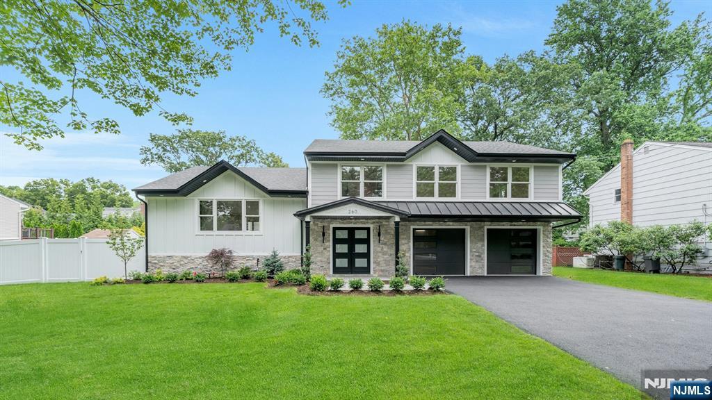 Step into modern comfort and timeless charm in this beautifully renovated 4 bedroom, 3.5 bathroom home featuring a striking modern farmhouse exterior and sleek contemporary interior. Every inch of this home has been thoughtfully redesigned to create a light filled, open concept layout ideal for todayâ€™s lifestyle. The ground level welcomes you with a spacious foyer, a cozy custom family room, a stylish half bathroom, laundry room, and access to the attached 2 car garage. A floating central staircase with a modern design seamlessly connects all levels, adding architectural elegance and visual flow. The main floor is an entertainerâ€™s dream, completely open with a formal living room featuring a statement fireplace, an inviting dining area, and a custom kitchen complete with a waterfall-edge center island, Carrara white cabinetry, and ample counter space. Upstairs, the serene primary suite boasts a spa like ensuite and a walk in custom closet. Three additional generously sized bedrooms and a full main bathroom complete the upper level. The fully finished basement offers a spacious recreation area, full bathroom, and storage. Perfect for guests, a home gym, or media room. Don't miss this rare opportunity to own a home that blends warm charm with modern luxury in every detail. This property will certainly not last.