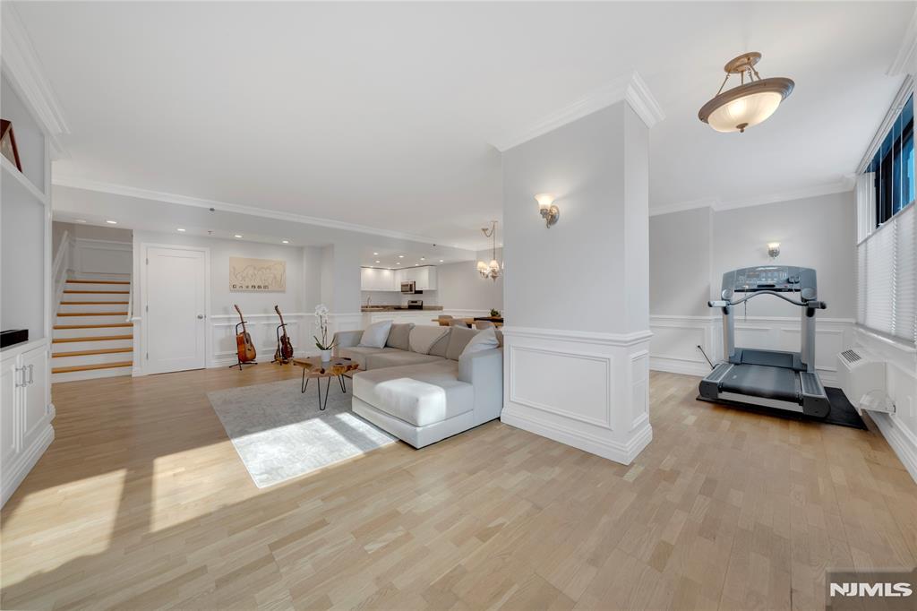 Experience elevated living in this stunning two-story luxury condo with a private entrance, set in a beautiful waterfront brick building in the highly sought-after north end of Hoboken. Enjoy New York City views, soaring high ceilings, and oversized windows that flood the home with abundant natural light. Designed for both sophisticated entertaining and comfortable everyday living, the spacious open-concept layout showcases rich hardwood floors throughout and a beautifully appointed designer kitchen featuring stainless steel appliances and expansive counter space. This exceptional residence offers two generously sized bedrooms, including a serene primary suite with a walk-in closet, along with two and a half elegantly finished bathrooms. Perfectly positioned for commuters and lifestyle enthusiasts alike, the home is just moments from the NYC ferry and bus, as well as Hobokenâ€™s premier dining, shopping, and scenic waterfront promenades. Residents enjoy access to luxury amenities including beautiful pools and a fully equipped fitness centerâ€”offering the ultimate blend of comfort, convenience, and upscale living. A rare opportunity to own refined waterfront living in one of Hobokenâ€™s most desirable locations.