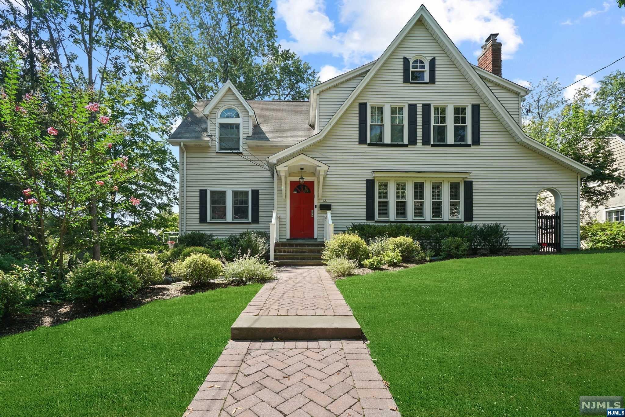 HIGHEST AND BEST DUE BY TUESDAY AUG 8TH @ 12PM. Discover a meticulously maintained & updated 5 bed, 3.5 bath col on a prime Tenafly street.The ideal 1st floor layout fts an open floor plan w/HDWD floors & an abundance of nat light streaming in through lrg windows enhanced by views of the BKYD.Enjoy a gas fplc & plantation shutters in the LR.The FR fts built-in bookshelves & glass sliding doors opening to the lrg deck making for easy indoor/outdoor living & connecting seamlessly to the DR & EIK w/SS appl & lrg breakfast bar sitting 5.The 2nd fl offers a spacious primary suite w/Vaulted ceiling & 2 lrg WIC's,bright updated bth w/dbl vanity & glass enclosed steam shower.3 addl BRs & updated full bth complete the 2nd flr.The LL offers a Rec rm,legal BR,full bth,lndry rm,pantry & storage.Step outside into the BKYD w/Oversized deck & gas line, perfect for alfresco dining.The fully fenced grass area w/Garden beds is surrounded by mature landscaping offering total privacy.