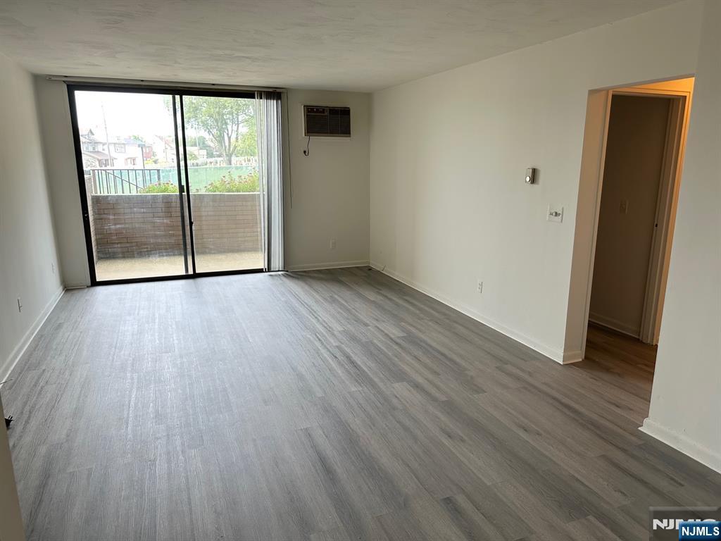 One bedroom 1 bath unit for rent on ground floor of quiet garden complex with brand new LVT flooring, private patio off living room, brand new stove and dishwasher. Outdoor pool. Coin laundry on site. 1 parking space included in the rent. (No pick-up trucks allowed to park per Condo Association rules). Tenant responsible for all utilities except cold water. Tenant responsible for move-in/move-out fees as per management company. Steps away from quick NYC bus transportation and close to everything. No pets and no smoking. Available immediately!