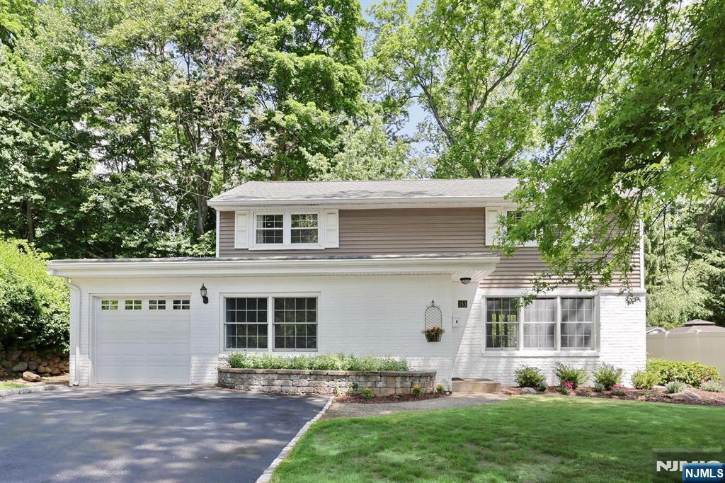 Welcome to this classic Zamore-style Colonial located on a dead-end street. This well maintained home offers charm with beautiful newly re-finished oak hardwood floors on first floor and all upstairs bedrooms, central air, newer roof and a functional layout designed for todays lifestyle. First floor features an entry area leading into a spacious living room with wood-burning fireplace, dining room with sliding doors to backyard, kitchen w/tile floor, plenty of cabinets and generous counter space, family room w/newer carpet, laundry area and powder room. Second floor has 4 bedrooms, full bath and access to attic with pull down stairs. The fully-finished basement provides flexible living and recreation space, storage area and utility rm. Attached 1-car garage, private backyard with paver patio and storage shed. Conveniently located near schools, shopping, restaurants, train and bus transportation.