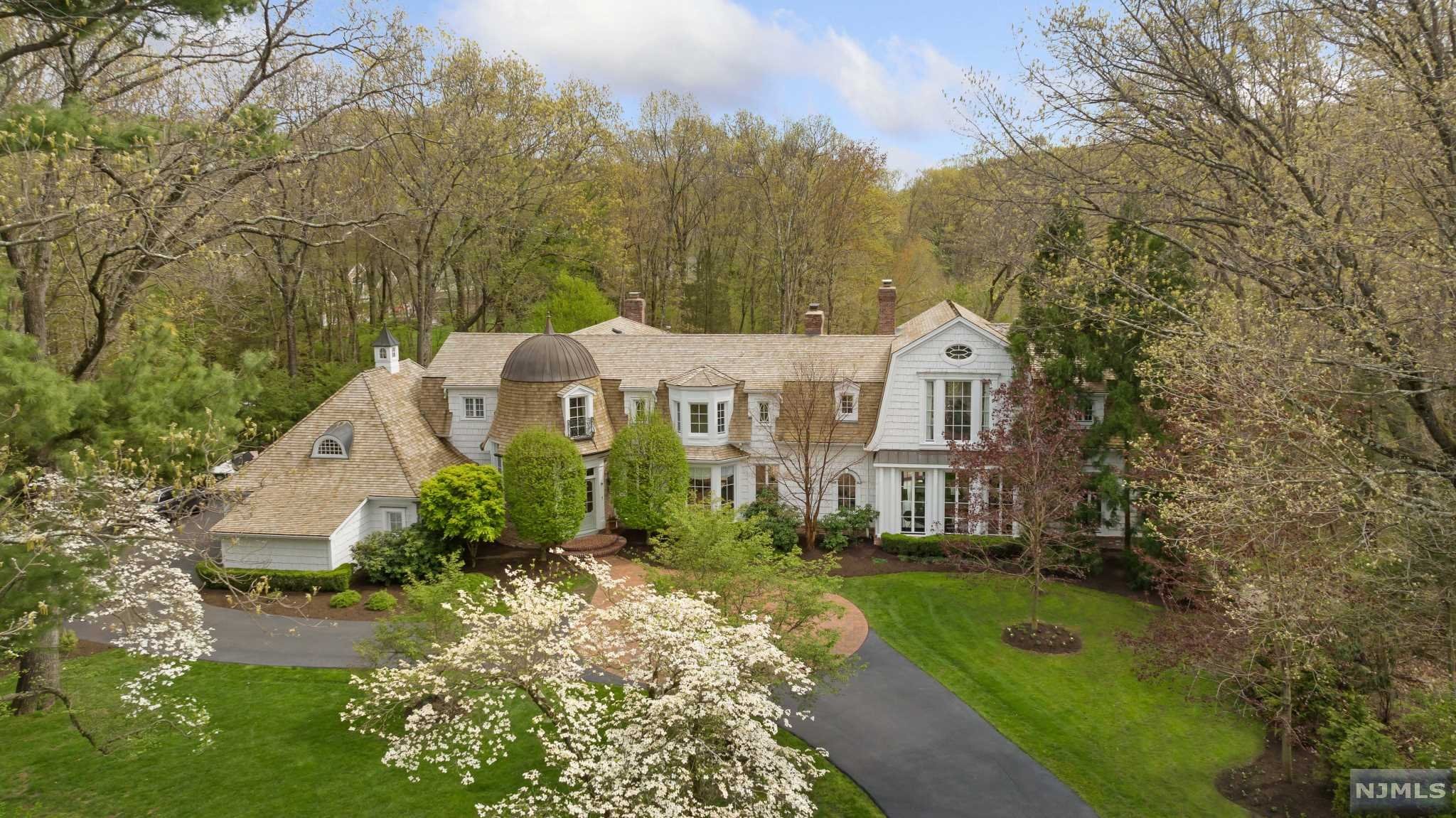 SHOWCASE ESTATE IN PRESTIGIOUS URBAN FARMS WEST GATE ON 1.3 ACRS THAT BACK UP TO GREENACRES PRESERVE. CUSTOM BILT BY W/EXQUISITE DETAIL & CSTM WOODWORK.NEWLY RENOV KTCHN TAKES GLAMOR TO THE NEXT LEVEL W/ HERRINGBONE WOODFLRS,CUSTOM CABINETRY,SLEEK ISLAND,MIELE APPLANCS INCLD. BUILTIN COFF.MACHINE. SUNNY DINING AREA W/FLR TO CEILING WNDWS OVERLOOKING PRVT BACKYRD OASIS W/PATIOS & POOL. STUNNING BANQUET SIZED DR W/FPL. DESIGNER LR OFFERS CLASSIC & CONTEMP SPACE W/FPL, BILLIARDS RM W/FPL/WET BAR. 2 PWDR RMS, LNDRY RM, TONS OF CLOSET SPCE, GUESTRM W/ENSUITE BTH & OUTDOOR ACCESS COMPLETES 1ST FLR. 2ND FLR PRIMARY SUITE HAS FLR TO CEILING WNDWS W/FRENCH DRS LEADING TO BALCONY OVERLOOKING POOL & GARDENS,FPL,WIC& 5 PIECE BTHRM. DOWN THE EXPANSIVE HLLWY 2 ADD. BEDRMS W/SHARED ENSUITE BTHRM & BR W/ENSUITE BTH. THE FINISHED LOWER LVL INCLDS GYM,ENT RM W/TEMP CONTROL WINE STRG SYSTM,FBTH&BDRM. THIS HOME ENJOYS IDEAL PRIVATE PRIVATE CUL DE SAC LOCATION!