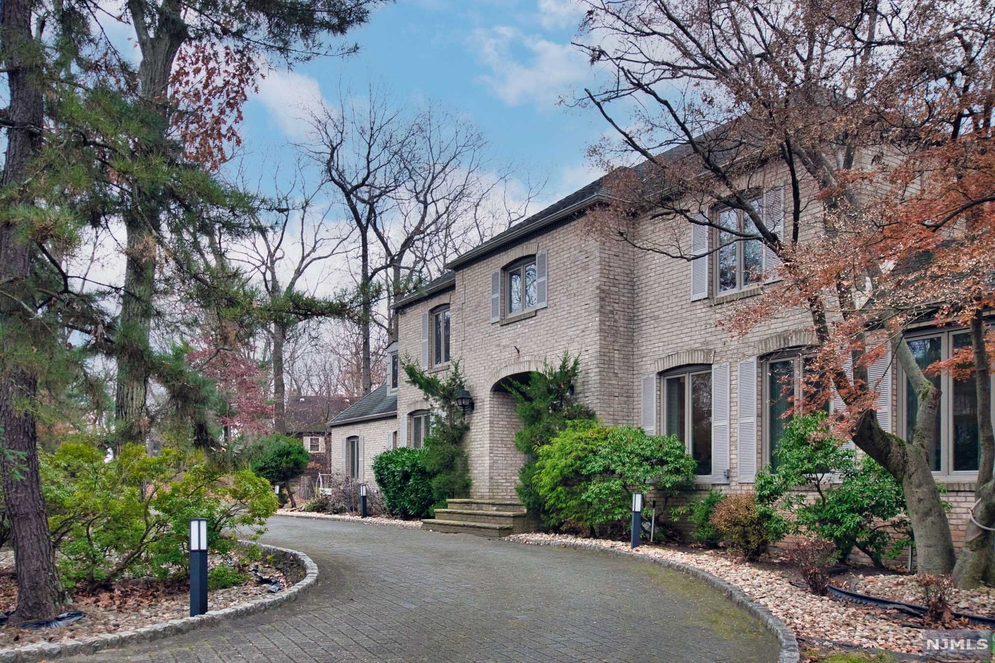 Beautiful luxurious custom built colonial estate home on .90acre property set on a Cul-De-Sac street in the scenic Watchung Mountain ridge and it outfitted with custom deck and fenced outdoor in-ground pool. It is truly a sanctuary nestled on the top of Watchung Mountain cozy neighborhood and only 3 miles from major highways - RT 78 and RT 22 and one mile from Watchung Lake. This home is on one of the most revered street in Watchung neighborhoods with the finished basement. Approx. 4,700 SF living spaces. Master BR has an suite bathroom and custom closets. The finished basement provides additional spacious recreational living space with fireplace, full bath, home gym space and a path to the outdoor pool and backyard. Don't miss it and must see!!!