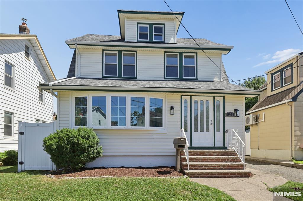 Newly renovated and refreshed 3 bedroom, 3 full bath house with a private yard. First floor open living space with a living room and dining room. New kitchen cabinets and appliances. Second floor 2 large bedrooms and a full bathroom, there is a third room with access to an attic bedroom. Basement is fully finished and includes a full bathroom. New AC split units throughout the house.