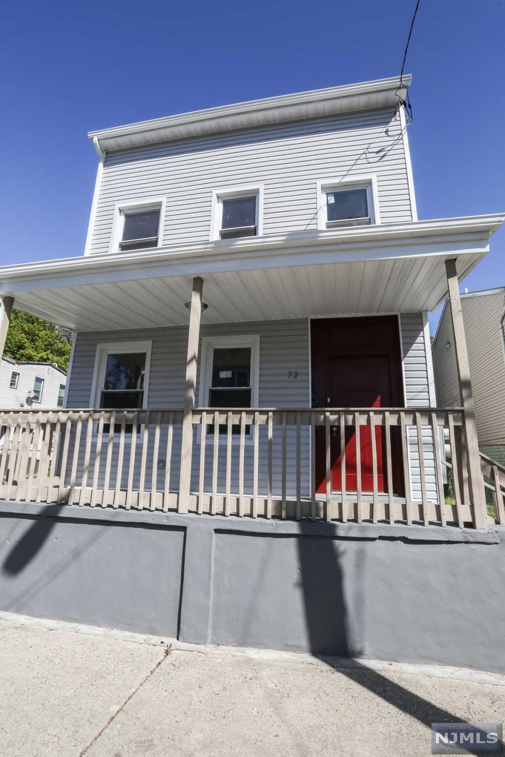 COMPLETELY GUTTED AND REBUILT. Essentially a brand new interior with a new layout. Each unit has their own W/D connection. First floor is a two bedroom unit with an open concept living room and kitchen. First floor also has a back office which leads to the rear door to the backyard. The second unit, is on the 2nd and 3rd floor. Large open concept Living Room, Dining Room, and Kitchen. Laundry room off the kitchen towards the back of the house. The second floor boasts with open space and two bedrooms. THIS WILL NOT LAST!
