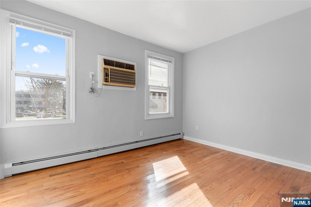 Enjoy modern comfort in this charming 2nd-floor walkup located in the heart of Hackensack! This spacious 3-bedroom, 1-bathroom apartment features a renovated kitchen and bathroom, sleek finishes, and hardwood floors throughout, all freshly updated with new paint to create a bright and inviting living space. Perfectly situated just steps from public transportation to NYC, this apartment offers unparalleled convenience for commuters. You'll also love the proximity to local dining, retail shops, and major highways, making it easy to explore everything Hackensack has to offer. Though there's no on-site laundry or parking, the central location and stylish upgrades make this home an excellent choice for professionals, students, or anyone seeking to live in downtown Hackensack.