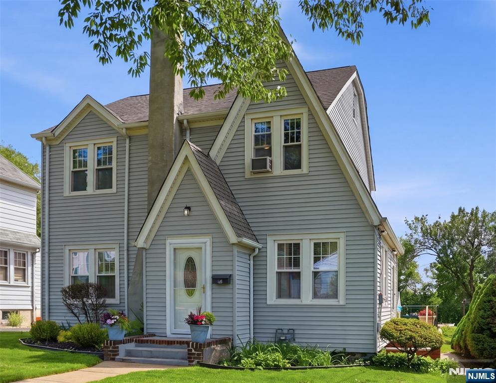 This fully renovated Colonial in the Country Club section of Teaneck offers luxury living at its finest. The home has been updated for modern living, beginning with the stunning chef's kitchen complete with quartz counters, high-end appliances and premium finishes. Gleaming hardwood floors run seamlessly throughout the entire residence, enhancing the bright and open feel. The home features three generous bedrooms, two beautiful bathrooms and a huge third floor loft!. A convenient first floor laundry room adds exceptional functionality to its layout. Outside, the property boasts a rare, oversized two-car detached garage, providing substantial storage, workshop and parking flexibility. Capitalizing on its central location, the home provides easy access to local parks, shopping, dining, and prime commuter routes into NYC. This property represents a unique opportunity to own a move-in-ready residence that perfectly balances modern living amenities with classic curb appeal! Call Today!!