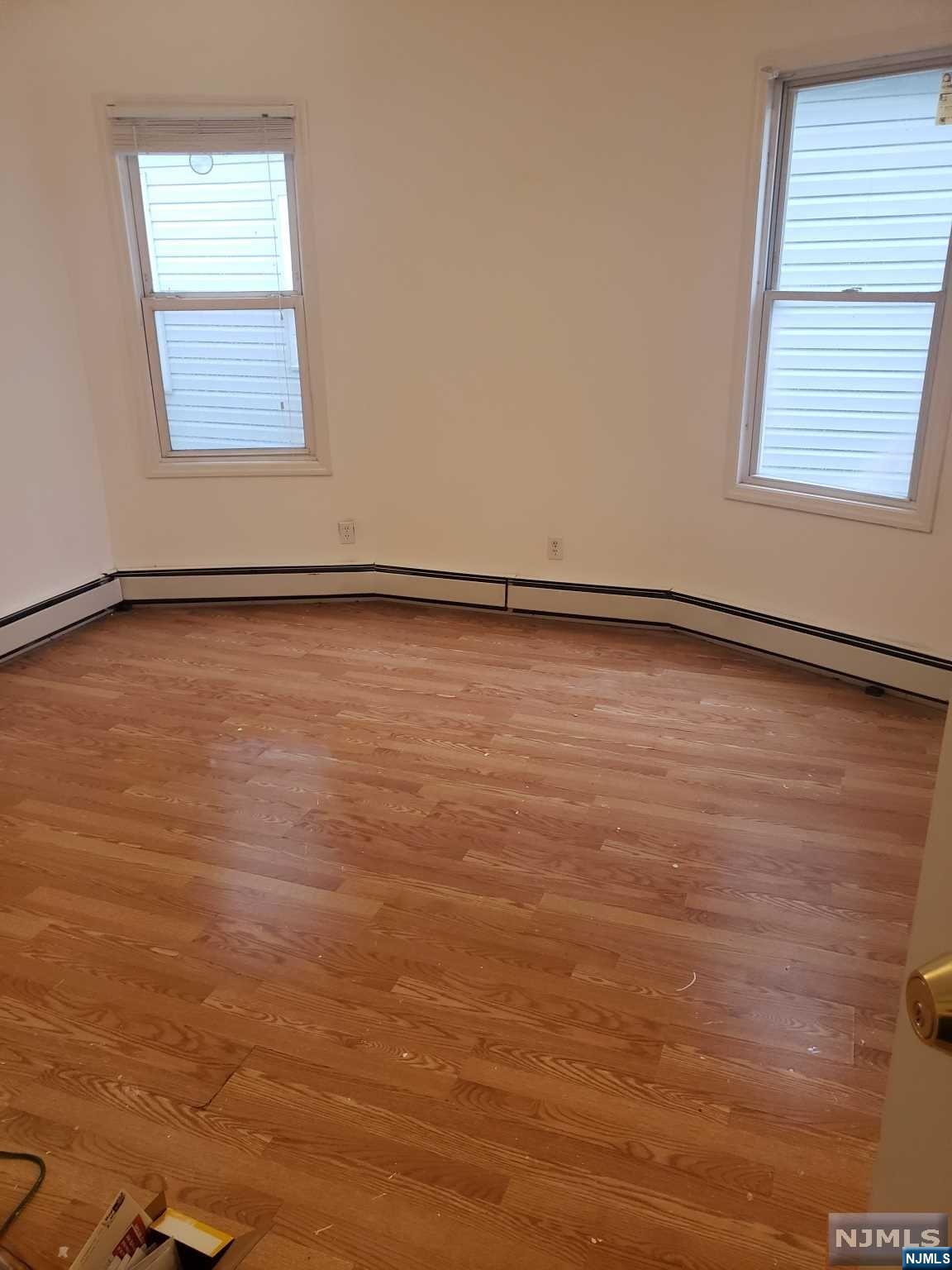 Charming East Orange Gem!!: Very well maintained multifamily with dual units, each featuring 3 bedrooms and 1 bathroom. Bonus!!: Second floor unit offers exclusive access to the finished attic complete with a full bathroom. The spacious basement just needs your creativity and finishing touches. Nestled on a tranquil street, this property offers a great opportunity for an investor or owner-occupant. Don't miss out!