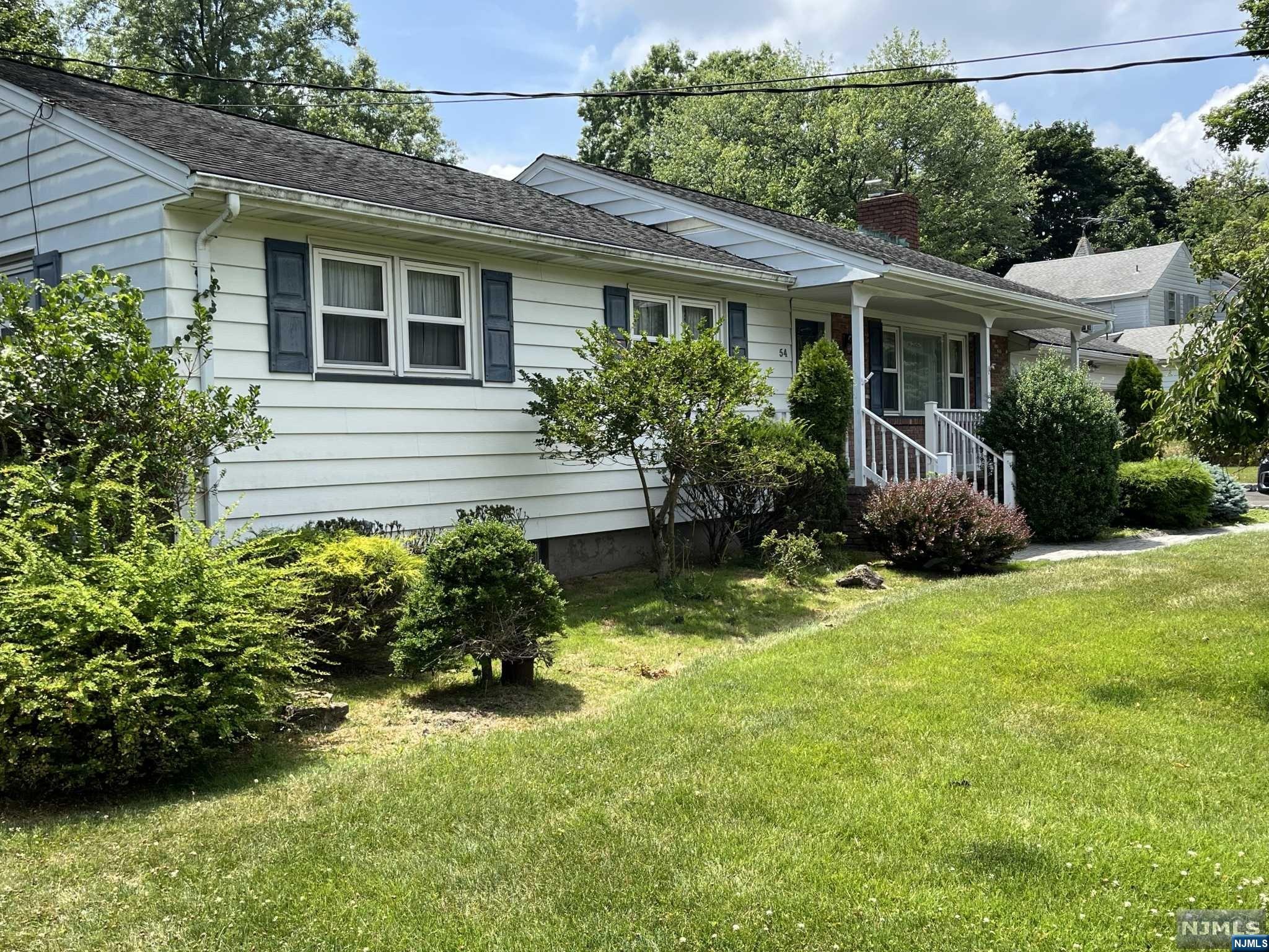 This lovely home is nestled on just over 1/3 level acre on a tranquil, tree-lined street. Its farmhouse vibe greets you with the prolific, casual charm of the Classic 1950s ranch-style home. This home offers single-floor living, with living room, dining room, kitchen, 3 bedrooms, 1 full bathroom and 1 half bathroom on level 1. The finished basement provides additional living and recreation space. An extra-wide 2 car garage will comfortably accommodate 2 large vehicles, and your storage. Relaxing in the summer sun, or marveling at the autumn foliage, the seasons will delight you while lounging in the sun porch, and in the spacious backyard. Minutes to schools, shopping and highways.