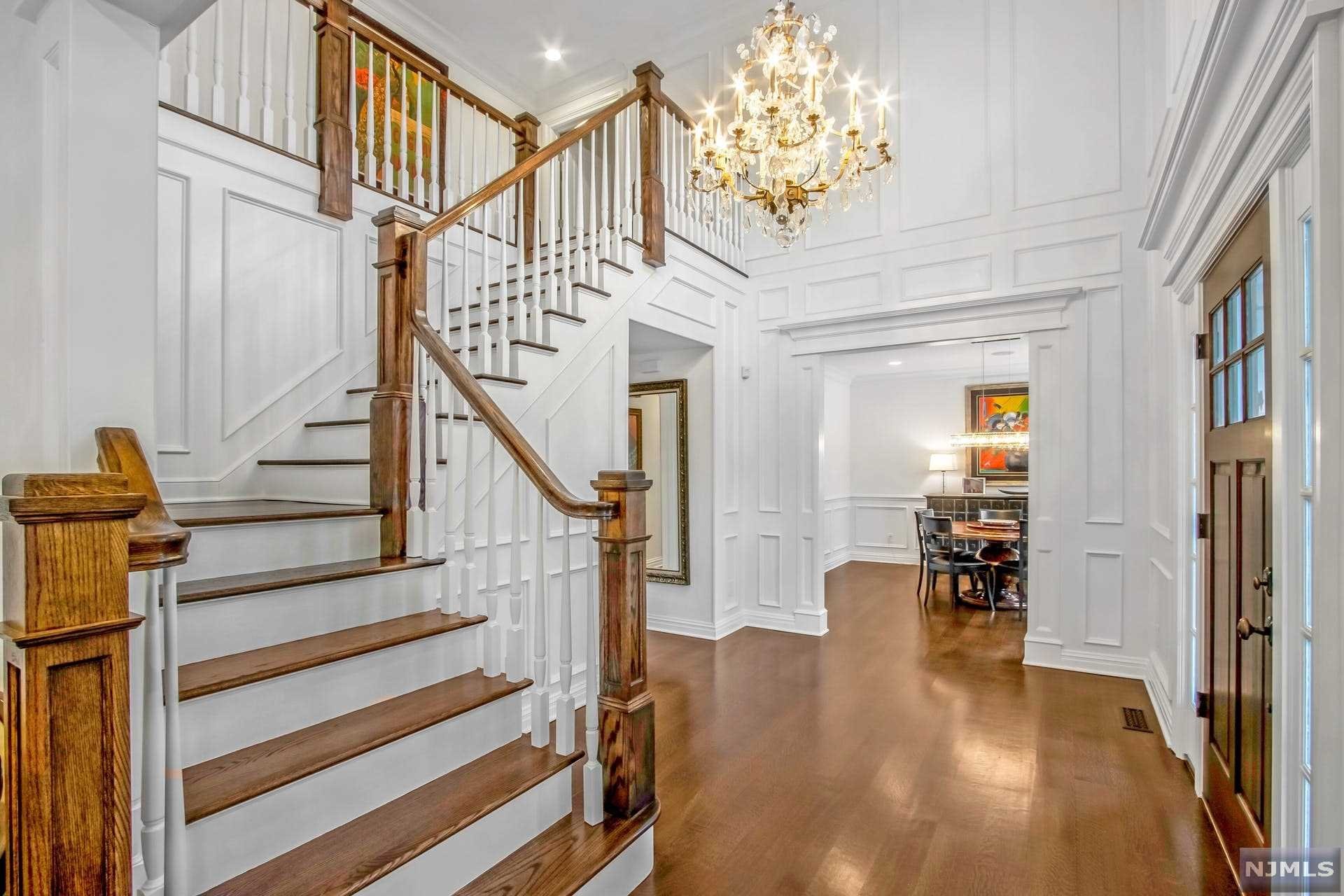 FABULOUS CUSTOM-BUILT HOME SITUATED IN AN AMAZING NEIGHBORHOOD ON THE EAST HILL OF DEMAREST FEATURING 5 BEDROOMS, 4 FULL AND ONE HALF BATH. TWO-STORY ENTRY FOYER WITH CUSTOM ARCHITECTURAL ENHANCEMENTS, NEW WOOD FLOORING, FORMAL LIVING ROOM W/ADJACENT SITTING AREA, FORMAL DINING ROOM WITH WET BAR, NEW PETER SALERNO KITCHEN W/STATE-OF-THE-ART APPLIANCES, FAMILY ROOM W/FIREPLACE AND COFFERED CEILING WITH ACCESS TO THE NEW OUTDOOR LOGIA, MUD ROOM, LAUNDRY RM AND POWDER ROOM COMPLETE THE FIRST FLOOR. PRIMARY SUITE WITH LARGE SPA-LIKE BATHROOM, HUGE WALK-IN CLOSETS AND DRESSING AREA, EN SUITE BEDROOM PLUS TWO ADDITIONAL BEDROOMS W/JACK & JILL BATHROOM. LOWER LEVEL FEATURING HIGH CEILING, SPACIOUS REC AREA, BEDROOM, FULL BATHROOM AND STORAGE. NEWER HVAC SYSTEM, SOUND SYSTEM, SECURITY SYSTEM W/CAMERAS, FULL HOUSE GENERATOR ARE JUST A FEW OF THE MANY UPGRADES IN THE HOME. GREAT LOCATION, BLUE RIBBON SCHOOLS, EASY COMMUTE TO NYC, CLOSE TO SHOPPING AND DINING. AMAZING OPPORTUNITY!!
