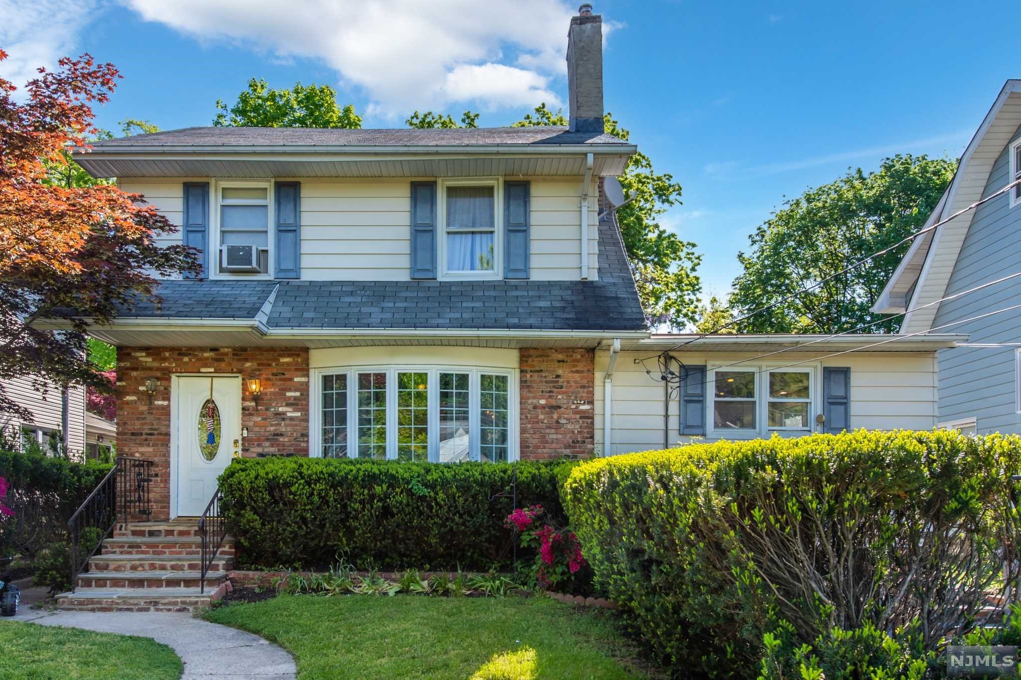 YOUR SEARCH ENDS HERE!!Location, Location, Location. Curb appeal is in full effect with this beautiful colonial near trains, shopping, and schools. Enter into the welcoming LR w/ hardwood floors, large window and fireplace. Continue to the formal dining room and into the oversized kitchen that is bathed in natural light, half bath and office. Head upstairs find the master bedroom, 2 additional bedrooms & full bath. The back yard runs deep and is perfect for entertaining. 1 car attached garage. Walking distance to NYC buses perfect for commuters and highly rated schools make this an opportunity that can't be missed! THIS IS A MUST SEE!!