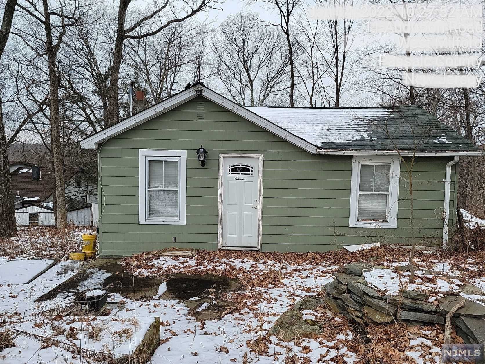 Great home with great bones. Handyman special bring your tools and make this your dream home. This is total rehab home being SOLD AS IS. Seller will make no repairs. Well & Septic status unknown. Enjoy lake rights to Upper Greenwood Lake. Come check this home out...WILL NOT LAST! Cash or 203k loan only.