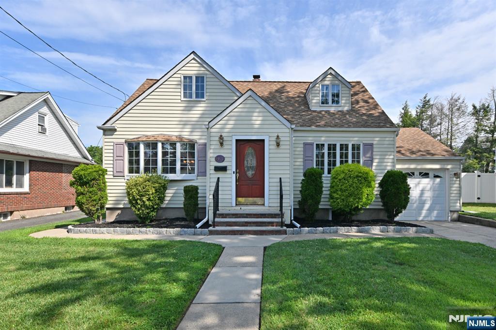Welcome to this lovely 4-bedroom, 2-bath home, perfectly situated on a quiet residential street while offering exceptional convenience to shopping, schools, parks, major highways, and NYC transportation. Lovingly maintained throughout the years, this inviting home offers a comfortable and functional layout ideal for everyday living. Hardwood floors are located beneath all carpeting, providing an opportunity to reveal their timeless beauty. Additional features include central air conditioning, a finished basement that provides valuable extra living space for a recreation room, home office, or gym, and an attached 1-car garage. Step outside to a spacious, level backyard, perfect for entertaining, gardening, play, or simply relaxing. Combining a peaceful neighborhood setting with an unbeatable location, this home is ready for its next owners to enjoy and make their own. Don't miss this wonderful opportunity!