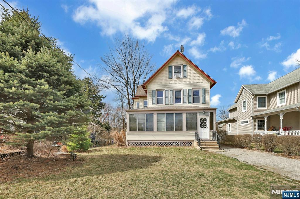 Buy the football field and get the house for free! You are going to love this pristine and turn key colonial with character and charm and a 300 ft deep property with jaw dropping sunsets! Enjoy the cozy and inviting heated front porch for your morning coffee, formal living room, formal dining room with large window seat, spacious kitchen, and powder room. 2nd level offers 2 bedrooms with a full bath and a finished bedroom on the 3rd floor with attic storage. Basement is unfinished with great possibilities to make a play room, gym, etc. There is a detached garage that can be used as a workshop or shed or finish the driveway and use it as a garage. The yard has so many possibilities and is such a rarity on this side of town. Enjoy the convenience of daycares and houses of worship within walking distance, close to highways, Mahwah train station, NYC bus, restaurants, and shopping,. Take advantage of Campgaw for skiing in the winter and Ramapo Reservation for hiking in the summer.