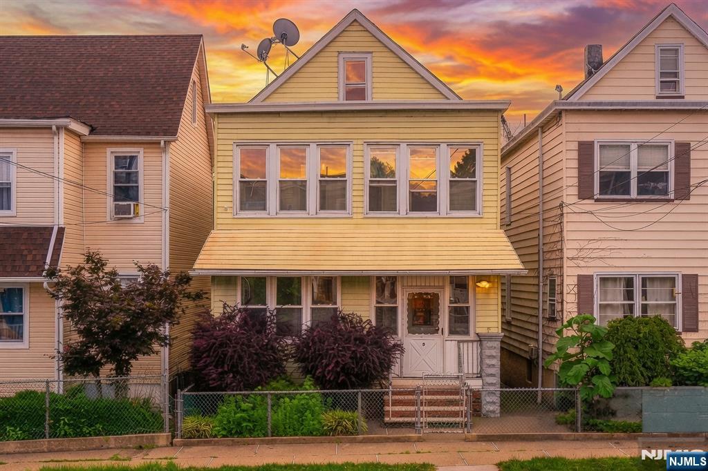 LOVELY & BRIGHT, WELL MAINTAINED 2 FAMILY HOME CONVENIENTLY LOCATED NEAR NYC TRAIN & BUS ACCESS. EXPERIENCE THE NICE KITCHENS, BATHROOMS & SPACIOUS LIVING ROOMS. BOTH FLOORS ARE IDENTICAL OFFERING LR, DR, KIT, 2 BRM & FBATH. PORCHES ARE ENCLOSED & USED FOR STORAGE. FULL, UNFINISHED BASEMENT W/LAUNDRY, UTILITY ROOM & GROUND LEVEL ACCESS IS PERFECT FOR ADDITIONAL STORAGE. SEPARATE UTILITIES, NEWER FURNACES, 100 AMP ELECTRICAL PANELS & MORE. THE FENCED-IN BACKYARD IS GREAT FOR ENTERTAINMENT OR OUTDOOR RELAXING. THE REAL ESTATE TAX IS ONLY $6,697. STREET PARKING ONLY. THIS TRULY IS A GREAT & AFFORDABLE HOUSE FOR A 1ST TIME BUYER, AN INVESTOR OR 1031 EXCHANGE. NOT A DRIVE-BY. MUST BE SEEN!