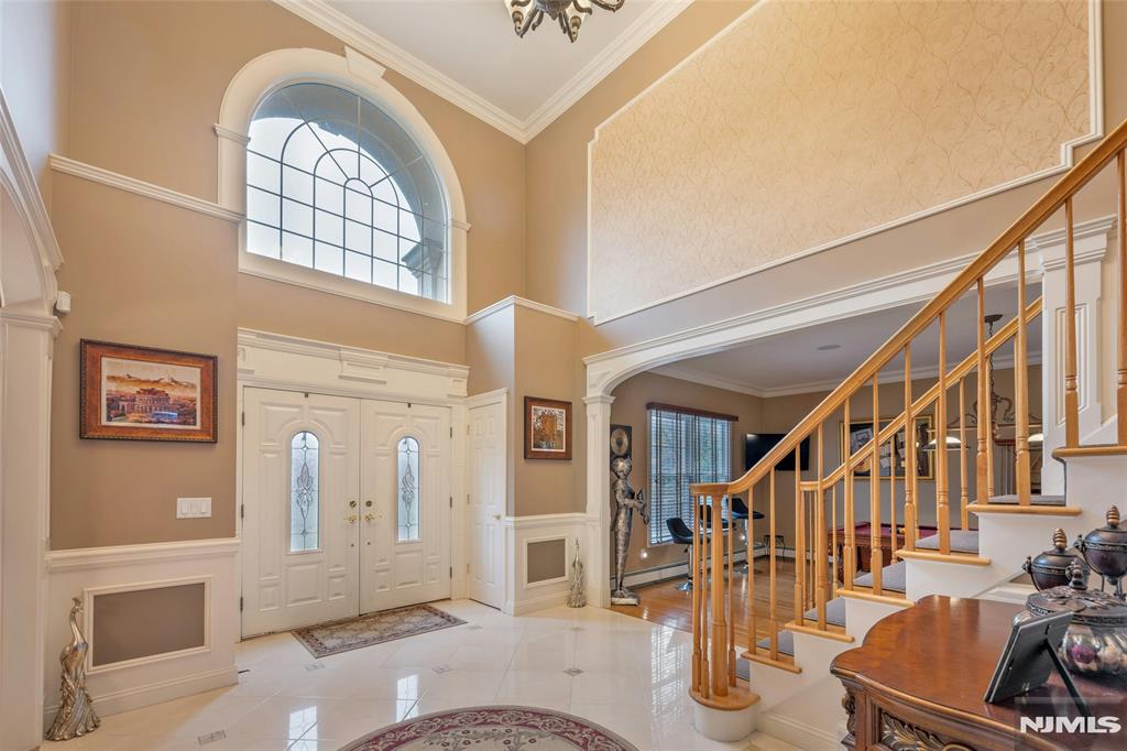 Get your popcorn! Lights, camera, action! Prepare to be dazzled by this showstopping home in Fairfield! Offering much more than meets the eye, this center hall colonial is a true gem. Located just a stone's throw away from NYC with the added benefit of being in a NON FLOOD zone, this property is the epitome of convenience & luxury. Boasting 5 bedrooms and 5 baths, including a sumptuous first-floor Bedroom suite, this home exudes comfort and sophistication. The expansive family room features impressive 2-story ceilings, while the first floor is equipped with a billiards room (Pool table included) for endless entertainment. As if that wasn't enough, the lower level is a true entertainment haven with a wet bar and double doors leading to the movie theatre with built in seating - perfect for hosting unforgettable gatherings. (Ping Pong Table and Shuffle board also included). Sono Speaker system in most rooms. The gourmet kitchen with a large center island/breakfast bar and huge pantry is complete with granite counters, Miele & Viking appliancesOutside, the generous backyard beckons with an inviting partial inground/above-ground pool, creating a private retreat for relaxation and fun. Outside you will find a paver driveway and walkway. Minutes away is the Fairfield recreation center with library, fields & walking paths. Don't let this opportunity slip away-make this spectacular home yours and elevate your lifestyle to new heights. Welcome home to luxury living at its finest!