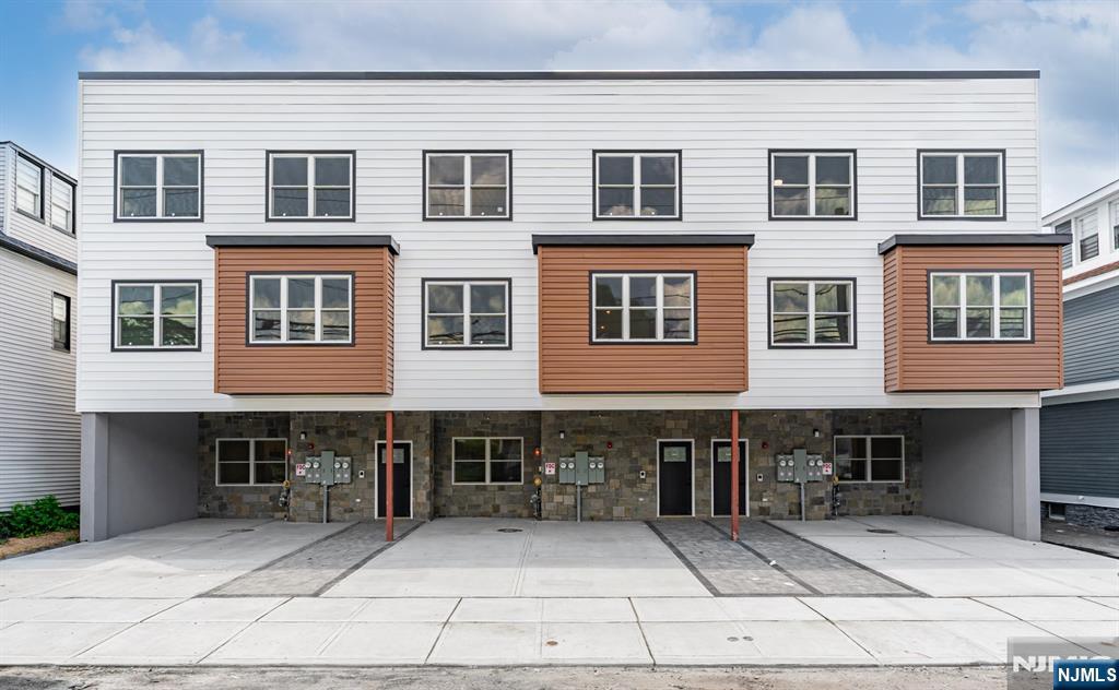 A rare opportunity to own a truly one of a kind, custom-built three-family property. Unlike anything else on the market, this unique offering features three attached buildings, each comprised of two spacious duplex residences for a total of six thoughtfully designed homes. Every detail was carefully considered, from the custom kitchens and designer bathrooms to the high-end finishes and functional layouts that set this property apart. Built with quality, longevity, and modern living in mind, this is a showcase of craftsmanship from top to bottom. Enjoy the added peace of mind of a 10-year new construction home warranty, along with the significant savings of a 5-year tax abatement. Whether you're an investor or owner-occupant, this is a landmark opportunity that simply cannot be replicated.