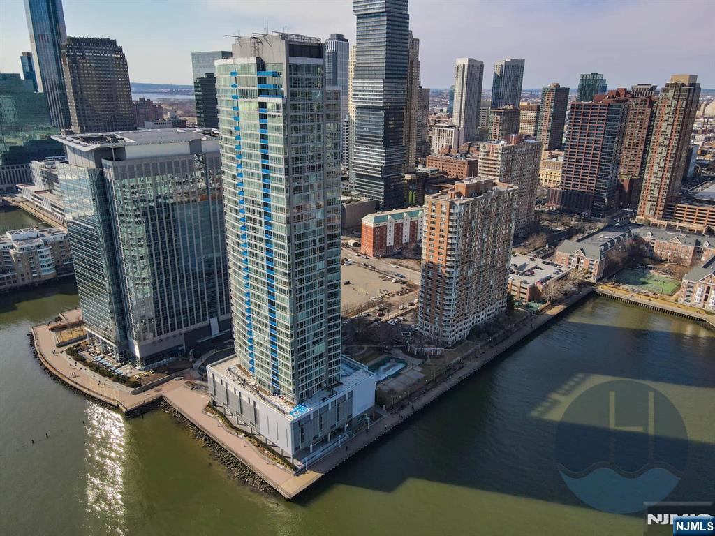 Experience luxury waterfront living at Crystal Point! Enjoy world-class amenities including a 24-hour concierge, fitness center, outdoor pool, resident lounge, and more. Located just moments from Exchange Place PATH, Ferry, and Light Rail, this premier address offers a seamless NYC commute, stunning waterfront surroundings, and easy access to top restaurants, cafés, shopping, and entertainment. Live where convenience, comfort, and sophistication meet. 24-hour concierge, fitness center, outdoor pool, resident lounge, children's playroom, screening room, waterfront promenade access, and convenient proximity to Exchange Place PATH, Ferry, Light Rail, dining, shopping, and entertainment.