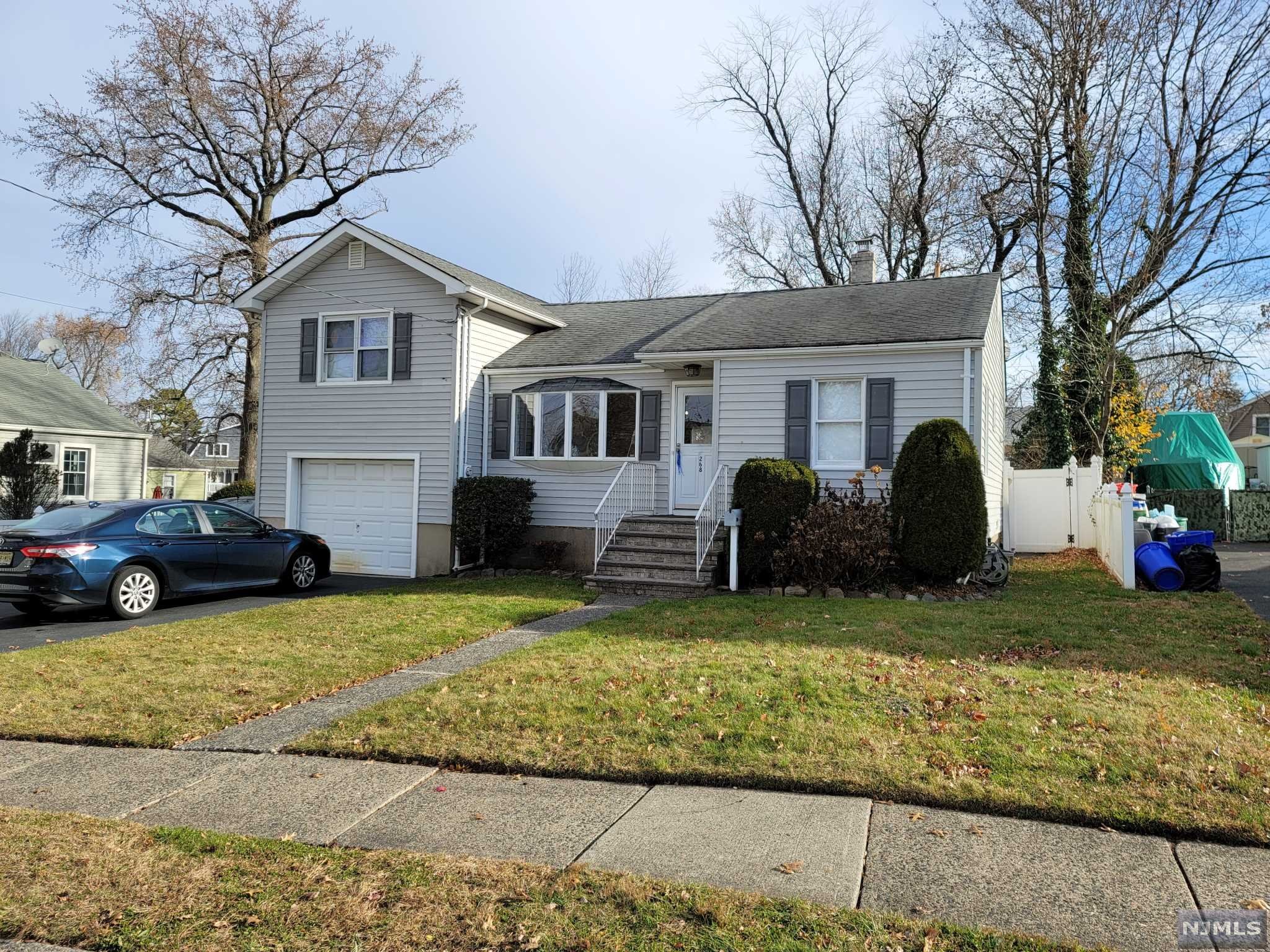 Charming S/L on large lot (66 x 123) which features 4 BRs, 2 Baths, LR, DR, Kit. Besslers to Attic Storage. Basement is full, unfinished, sump pump. Gas heat/BB. Hardwood floors as installed. Plenty of closet and storage space. 1 car attached garage w/ storage space. Parking for 4-5 cars in driveway. Vinyl siding. Spacious backyard. Must See!