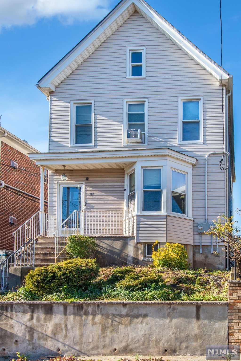 Great Investment property! Two-family house, top/bottom includes two spacious units each with 1 large bedroom and a smaller possible bedroom or office, eat-in-kitchen, living room and full bath. Top unit has additional porch room for den/office/bdrm. Nice-sized, usable back yard. Full, finished basement with laundry hook ups and lots of storage space. Updated electric, brand-new back deck and roof and siding recently done. Separate electric & gas. Centrally located near shopping, dining, transportation and highways.