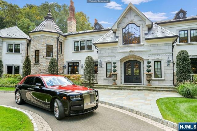 Chateau Sheree was custom built as a labor of love by the current owners. Every aspect of this Intricately designed estate was thought out at the highest level of detail and design. 2.4 acres of prime property and lush landscape offer an inground pool, full service cabana with kitchen & full bath & completely fenced & gated setting surrounding this work of art. The unsurpassed woodworking is throughout the estate and is enhanced by over 47,000 sheets of 22 karat gold leaf. Some of the amenities & features include 12 masonry fireplaces, 3-story elevator, 4-car garage with 4 lifts accommodating 8 cars, 28 zones of heating & cooling, a 5,200sft newly finished lower level with wine tasting/wine cellar/pub, spa, gym, bedroom/bath, gift wrap/craft room, 1.5 baths. This is a once in a lifetime opportunity to own one of the iconic estates in the Northeast within this close proximity to Manhattan.