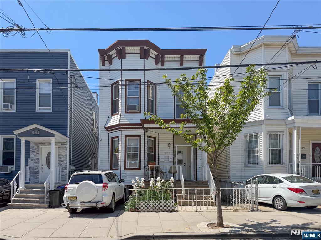 Welcome to the kind of property savvy buyers wait for â€” a versatile, value-add 2-family home in the coveted Union Hill section of Union City. Located on a tranquil, tree-lined block just moments from Bergenline and Park Ave cafés and shops, steps to Boulevard East offering scenic Manhattan skyline views. and an easy commute into NYC. This 5-bedroom, 3 full bath property offers functional and effortlessly livable layouts. The first-floor unit features a bright living room, eat-in kitchen with laundry hook ups, two generously sized bedrooms, and full bath â€” ideal for owner occupants and tenants alike. Upstairs, the second unit offers a living room, spacious eat-in kitchen, three-bedrooms plus a bonus room perfect for a home office, creative studio, nursery, or oversized walk-in closet. A finished basement adds exceptional utility, abundant storage, and an additional full bathroom. Other highlights include separate electric and gas utilities, independent steam radiator heating systems for each unit, one parking space, and a well-loved backyard oasis with a mature fig tree, herbs, and veggies ready for your next harvest. Whether youâ€™re an investor looking for strong upside or an owner-occupant seeking rental income, this property delivers scale, charm, and opportunity with authentic neighborhood character. With a few light cosmetic touches, this Union Hill neighborhood gem is just waiting for you to build equity! Sold as-is. Buyer responsible for obtaining cert of occu