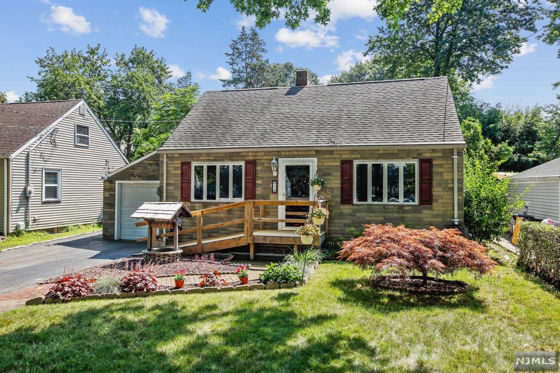 Welcome to this spacious Cape located in the Demarest section of Bloomfield, with a full bedroom and full bath on first floor. Generous living room, open dining area & kitchen also found on first level, plus hardwood floors, newer windows and central air. 2nd floor has two bedrooms and full bath. Primary bedroom includes a wood burning fireplace and loads of closet space. Basement is partially finished with tile flooring and additional storage; great potential for WFH space or family room. Large backyard features a patio, gas grill, garden space, a fish pond and a screened house (which can be taken down and stored in winter). Close proximity to NYC buses and GS Parkway, making it very convenient for commuters. Central Air on 1st floor only.Both bathrooms have tub and shower