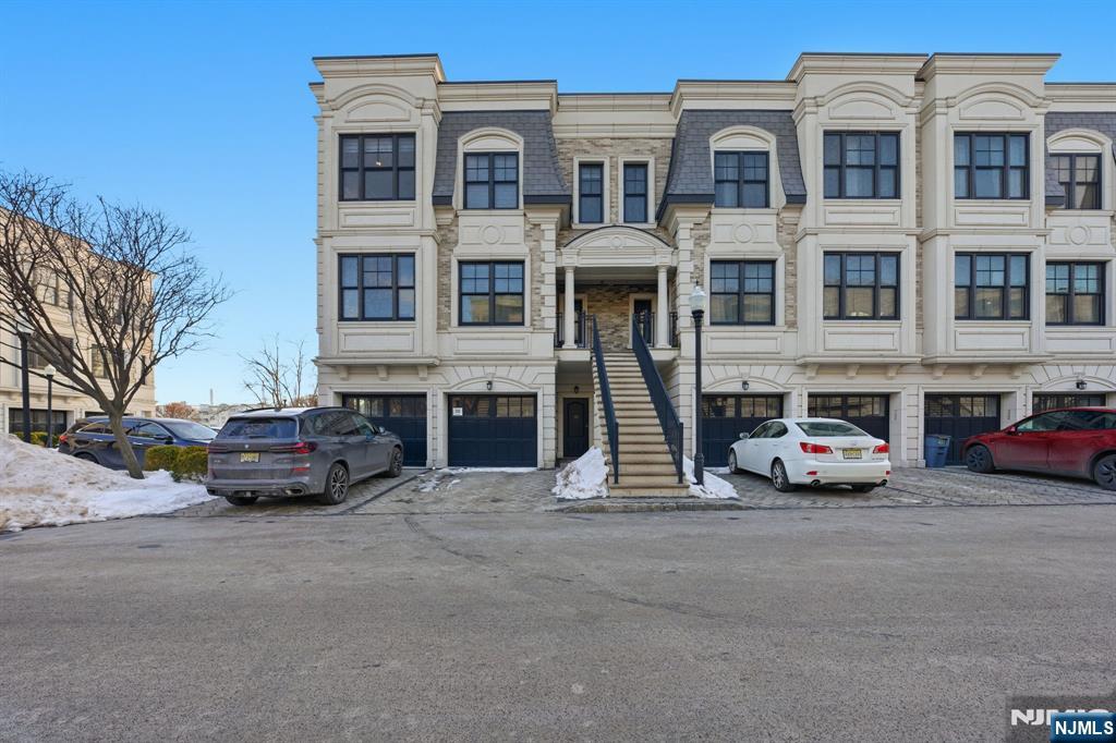Located in the gated waterfront community of Marquis on the Hudson in Edgewater, this elegant corner-unit townhome offers luxury living with immediate access to the Hudson River waterfront. This 2-bedroom, 3-bath residence features an open layout with hardwood floors, crown molding, high ceilings, and abundant natural light. The gourmet kitchen includes stainless steel appliances, granite countertops, and generous cabinetry flowing into the dining and living areas, ideal for everyday living and entertaining. The primary suite offers ample closet space and balcony access with partial river views, while the second bedroom is ideal for a childâ€™s room, guests, or home office. Highlights include in-unit laundry, attached 1-car garage plus additional parking, pool, lounge, gym, and landscaped grounds. Enjoy the largest backyard in the community and shaded outdoor parking that keeps your vehicle cooler in summer. Steps from the Hudson River Walkway, dining, shopping, and NYC transit.