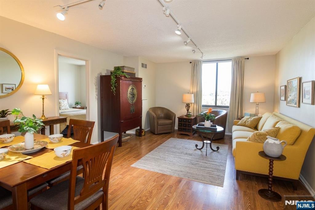 Bright and well-maintained 1-bedroom, 1-bath condo offering approximately 649 sq ft of comfortable living space in the highly desirable Harmon Cove Tower community. This unit includes one deeded covered parking space and features an efficient layout filled with natural light. Enjoy the convenience of a full-service luxury high-rise with exceptional amenities including 24-hour doorman/concierge, security, elevators, outdoor pool with cabanas, fitness center, sauna & steam rooms, tennis and basketball courts, play area, community room, and beautifully landscaped grounds with walking/jogging paths. Conveniently located near shopping, restaurants, major highways, NJ Transit, and easy NYC transportation, making this an ideal home for commuters, investors, or first-time buyers. Experience resort-style living in the heart of Secaucus!