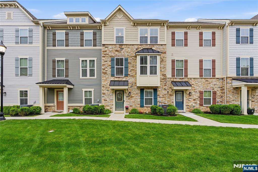 Beautiful turn-key 3-bedroom, 2.5-bath townhome steps from Raritan Bay, offering three levels of upgraded living space and a commuter-friendly location. Features include a gourmet kitchen with granite countertops, a center island, a pantry, and stainless steel appliances, plus an open-concept layout with hardwood floors, crown molding, and private balcony access. The spacious primary suite features a tray ceiling, a walk-in closet, and a spa-like bath with dual showerheads. Additional highlights include surround sound, hardwired internet, stone-front exterior, 2-car built-in garage, and a versatile bonus room perfect for an office, gym, or playroom. Conveniently located near parks, playgrounds, YMCA, beach, shopping, dining, NYC/Shore train lines, ferry access, and major highways. Property is being sold AS-IS strictly. The Buyer is responsible for obtaining the Certificate of Occupancy (CO) and the Fire Certification. Seller will not provide any credits or make any repairs.