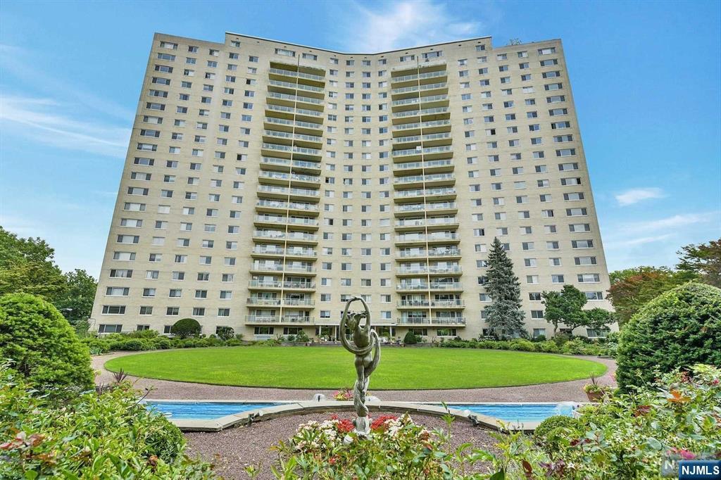 Imagine waking up every morning to stunning South Mountain Reservation views. This west-facing, two-bedroom, two-bathroom coop, flooded with natural light, awaits your personal touch. The spacious terrace offers privacy for the primary suite. Harrison Park Towers, a premier doorman building, elevates your lifestyle with shuttle service to the train station, a well-equipped gym, and easy access to SOPAC, NJPAC, and Prudential Center. Major highways and Newark International Airport are also close by. Enjoy the building's secret garden or socialize on the charming patio. Attentive staff handle landscaping and package delivery. The monthly maintenance fee covers property taxes, utilities, and building upkeep. Board approval and a 20% down payment are required.