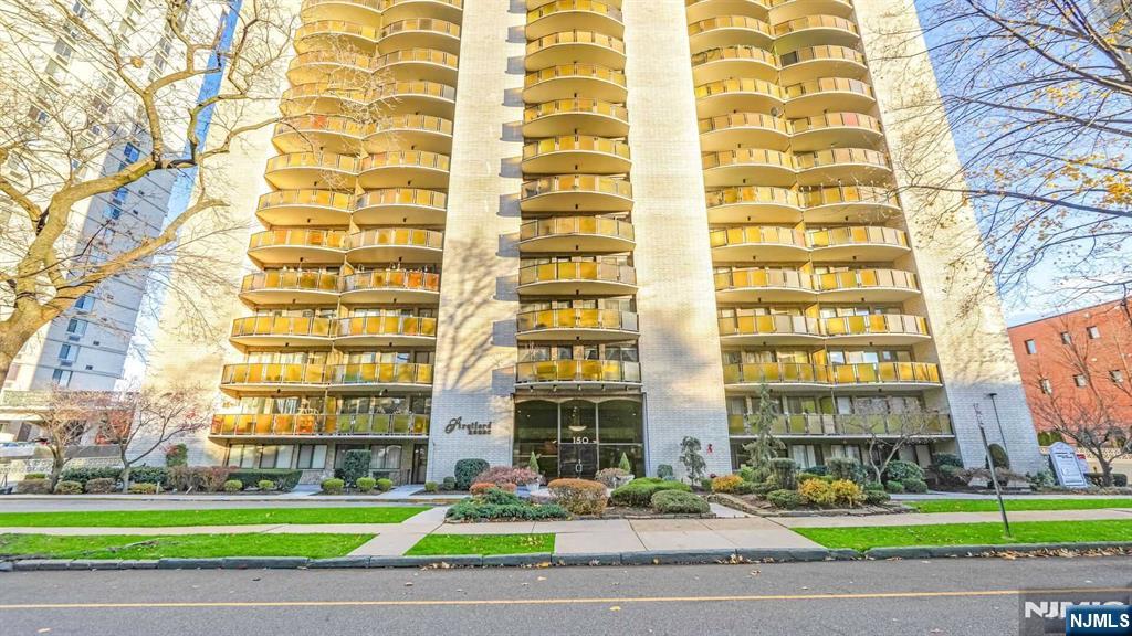 WELCOME to this Spacious Corner Unit in the Desirable & Centrally Located High Rise>The Stratford House where HOA's INCLUDES: ALL UTILITIES>Gas, Electric, Heat, Water, Hot Water & AC. ALSO INCLUDED: 24-Hour Doorman Concierge, Live on Premise Super & Exercise Room. Enter into a Bright & Open Concept Living Room & Dining Room offering access to your Private Balcony to enjoy Views of the NYC Skyline. Spacious Primary Bedroom w/Dual Closets & a Private Bath, 2 More Generous Bedrooms, Hall Bath & Updated Galley Kitchen. This location is blocks from NYC Express Bus and HUMC, close to Highways & Downtown Hackensack Shops, Restaurants, and Services. A Great Value within the City's High Rise Condo Market. It awaits your Finishing Touches to make it your Next HOME. Laundry is conveniently on your Floor. Unit offers all NEW WINDOWS, a Storage Bin Area & 2 Parking Spaces, one IN Garage-$40 & the other OUT-$30. Come by & See for Yourself!!