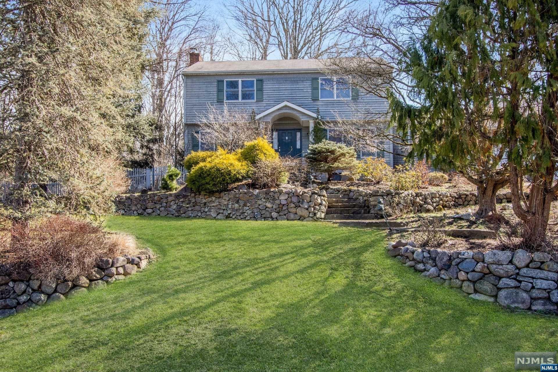 Lovely Center Hall Colonial on cul de sac, set on lush property with in-ground pool. Welcoming foyer into large living room with a brick fireplace. Spacious formal dining room leads into bright and spacious kitchen with views of the beautiful property. Large family room including access to the oversized 2-garage with sliding doors to a charming sunroom. Laundry room and half bath completes first level. The second level offers potential for primary suite including unfinished full bath with fittings, and 2 walk-in closets. Two large bedrooms and a full bath completes second level. Beautiful, lush park-like property with paver patio and in-ground pool. Great location! Close to schools and parks. A must see! Don't miss this great opportunity. This lovely home has so much to offer and is awaiting your personal touch and updates. Make it your own and enjoy the privacy of the Cul de sac location. This is a rare gem that won't last long HOME IS ASSESSED AT $842,900