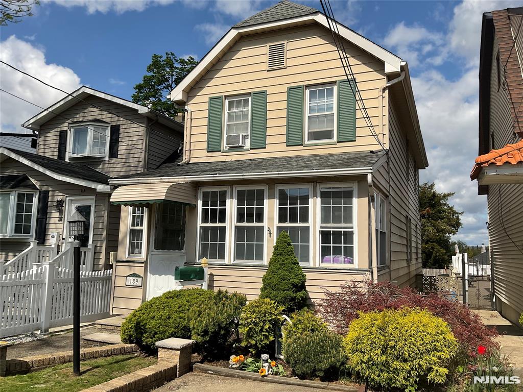 Welcome to this charming and well-maintained Colonial situated on an oversized 25' x 150' lot in one of North Arlington's most convenient locations. This 3-bedroom, 1.5-bath home combines classic character, generous living space, and exceptional value. The inviting first floor features a welcoming enclosed sun porch, spacious living room, formal dining room, and a large country-style eat-in kitchen with abundant cabinetry and room for everyday dining and entertaining. A convenient powder room completes the main level. The second floor offers three generously sized bedrooms and a full bath, while additional attic storage is easily accessible through Bessler stairs. The large unfinished basement provides endless possibilities for storage, a workshop, home gym, or future expansion and includes a walkout to the private backyard. Step outside and enjoy the deep, oversized backyardâ€”perfect for outdoor gatherings, gardening, recreation, or creating your dream outdoor oasis. Additional features include gas heat, private driveway, and low annual taxes of just $8,351. Ideally located near schools, parks, shopping, restaurants, major highways, and NYC transportation, this home is perfect for commuters and anyone seeking suburban living with easy access to everything. Don't miss this opportunity to own a classic North Arlington Colonial on an oversized lot with endless potential. Schedule your private showing today!