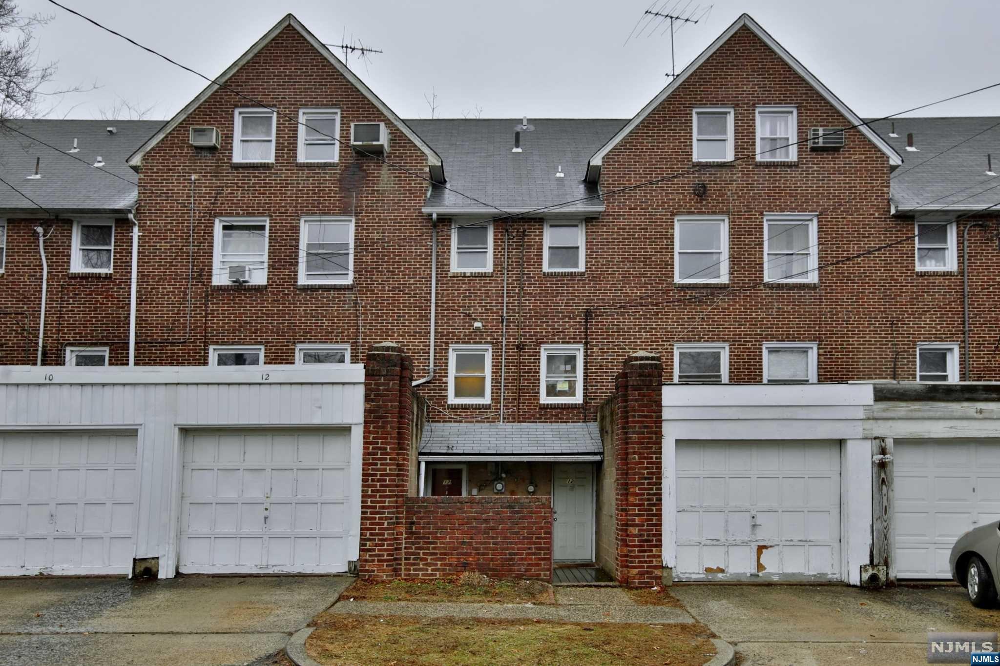 a commuter's dream! Radburn association multi-family generating income! A lovely brick two family on a quiet street. Spacious bedrooms. Separate utilities. 2 car garage, finished walk out basements W/Washers and dryers. Nice private yard. Hardwood floors. 1 & 3 Years HW heater. Updated bathrooms and kitchens. Located on the footpath to Radburn Park. Enjoy all Radburn amenities which include swimming pool, activities for kids and adults, tennis and more. Perfect for live in and rent out or investment. Radburn assessment is approx $527.00 per quarter. Minutes to the Train and bus and steps away from shopping and schools.