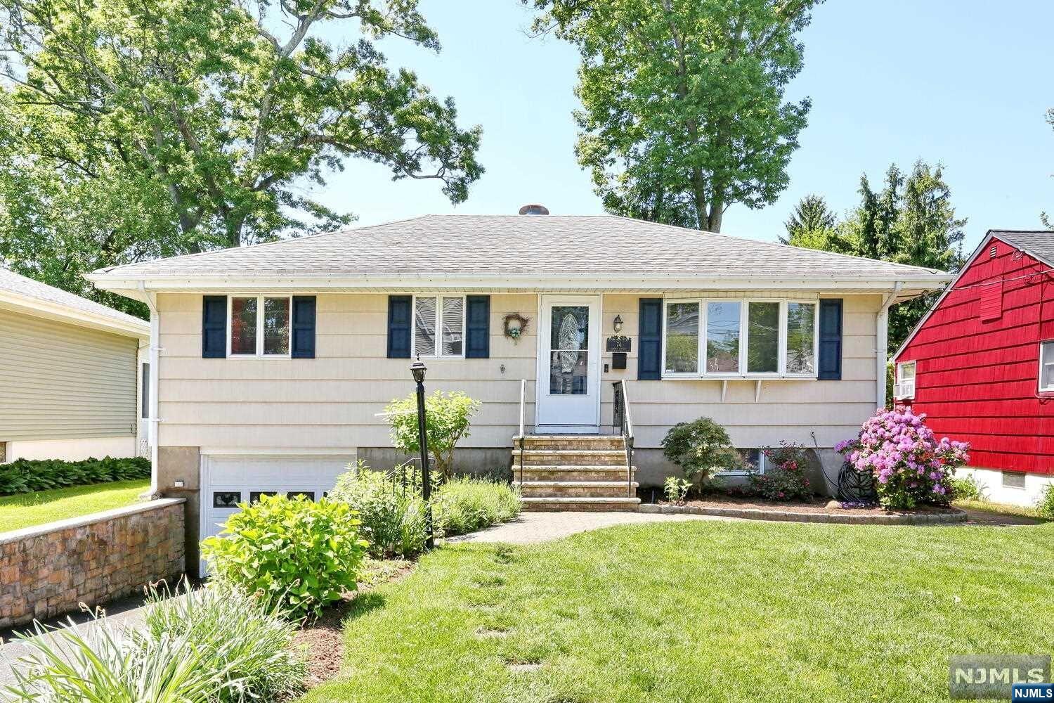 Welcome to this move-in 3 bedroom, 2 bath ranch in the sought after town of Waldwick! Step inside to find a spacious living room with gleaming hardwood floors, setting the perfect tone for relaxation and comfort. The heart of this home lies in the modern Eat-In Kitchen, featuring updated appliances, ceramic floors and granite countertops that are sure to inspire your inner chef. Open the sliders to reveal a deck overlooking the patio and private fenced-in yard, creating an ideal space for both play and entertainment. Downstairs, the lower level boasts a finished Rec/Family room complete with an office and a updated bathroom, providing ample space for all your needs. Additionally, you'll find a storage/utility/laundry room that offers plenty of room. This home is ideally located with easy access to schools, shopping, commuter train and bus, making everyday life a breeze. Don't miss out on this incredible value - schedule your showing today and make this dream home yours!"